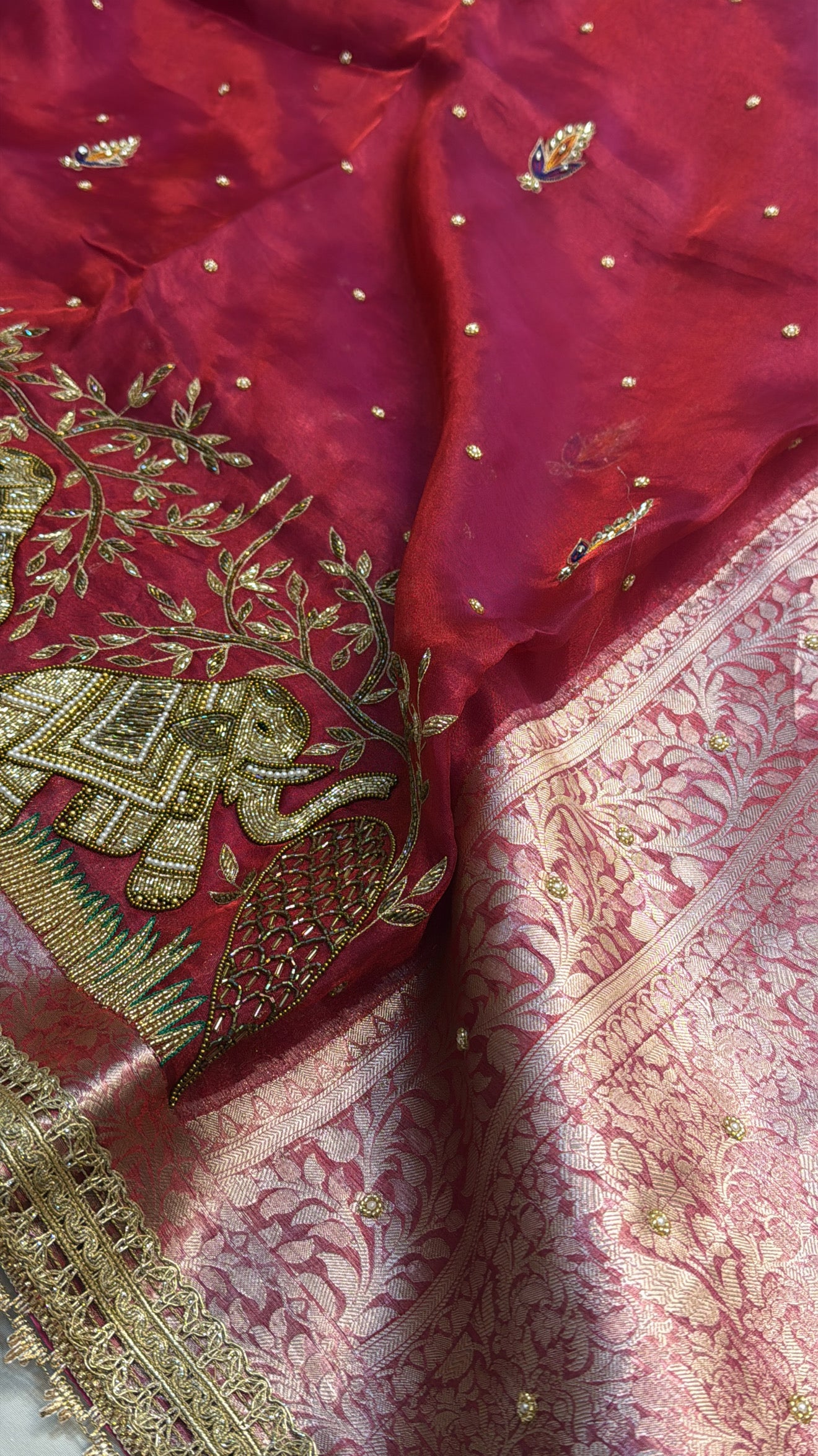 Dulhan ka joda husn red tissue silk hand embroidered saree