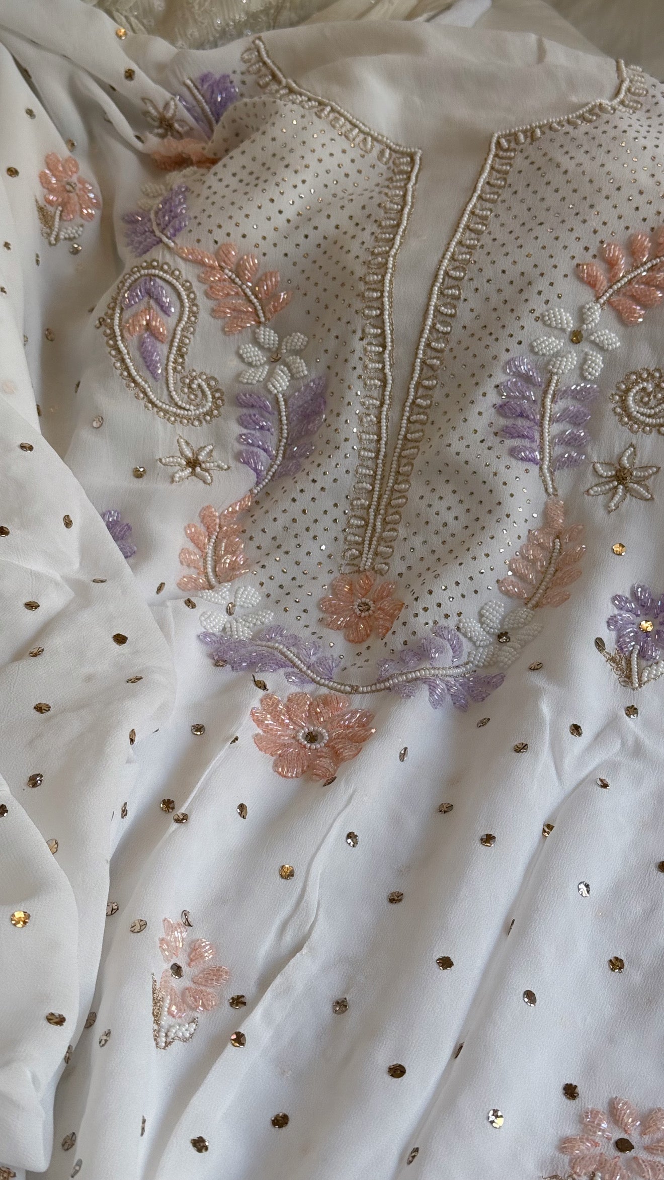 Banarasi gorgette mukaish and pearlwork hand embroidered kadhwa suits