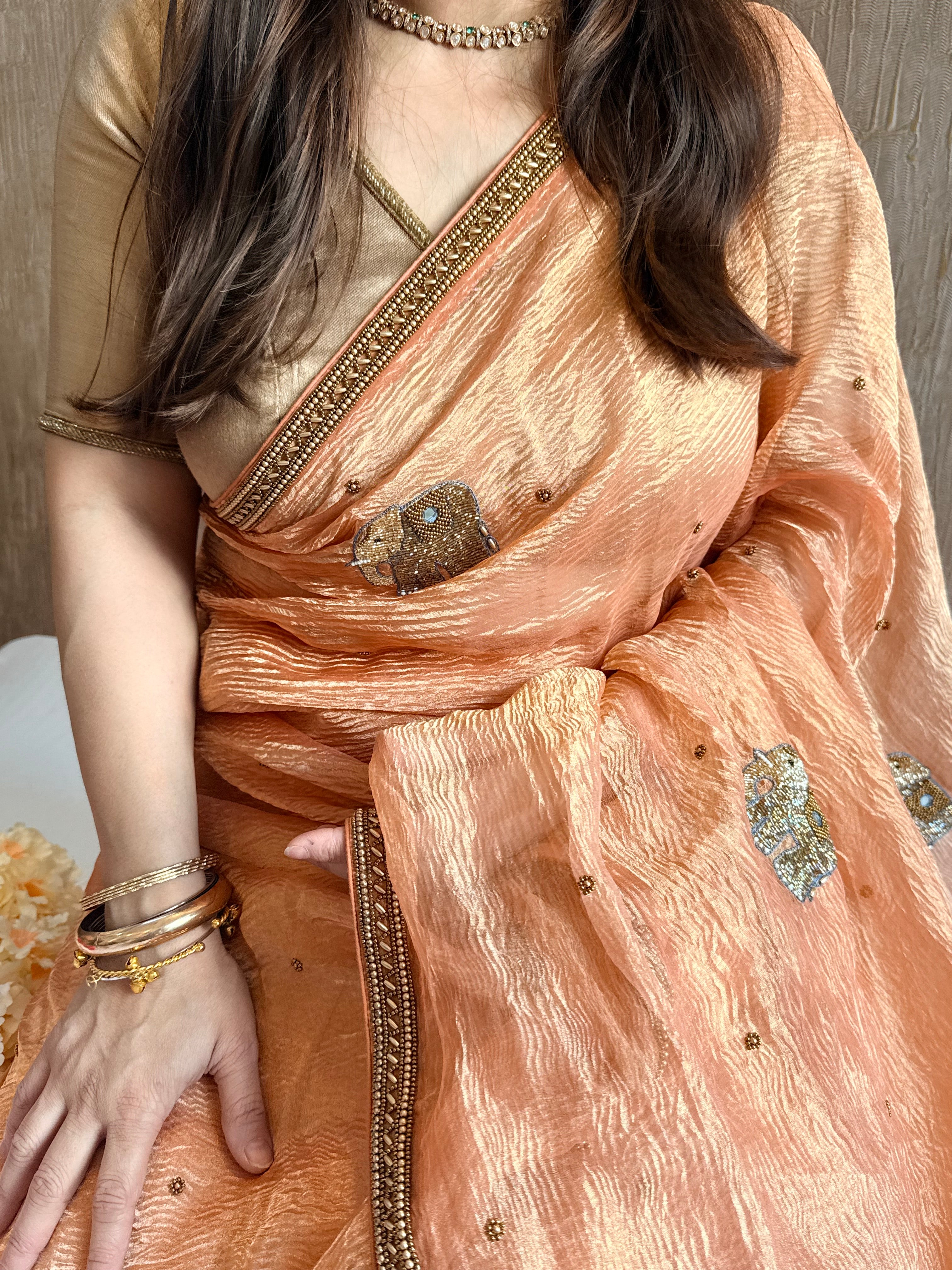Mirrorwork edit gajri peach crushed tissue silk hand embroidered saree
