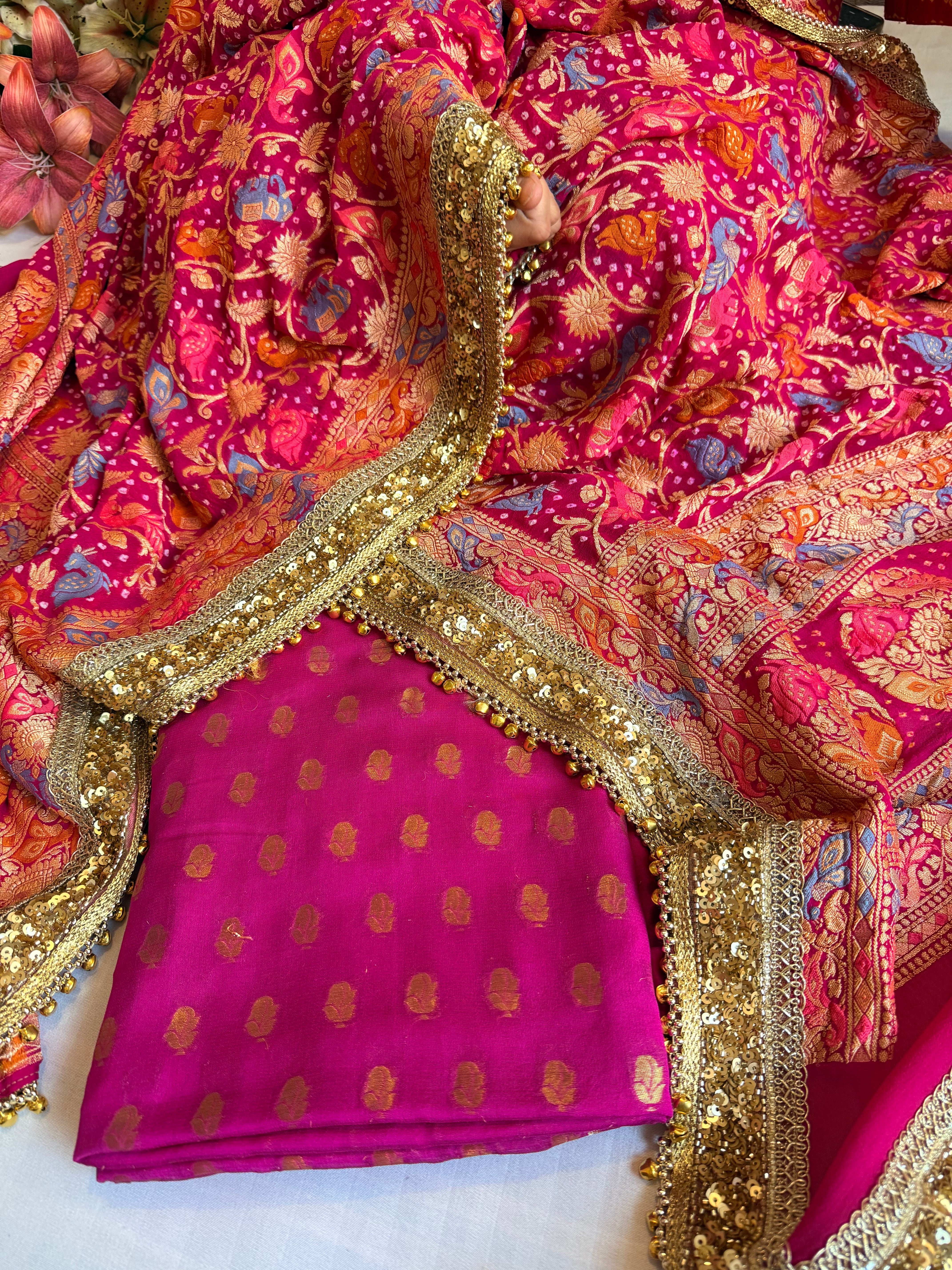 Banarasi hot pink bandhej ghungroo and sequin work chiffon gorgette kadhwa suit set