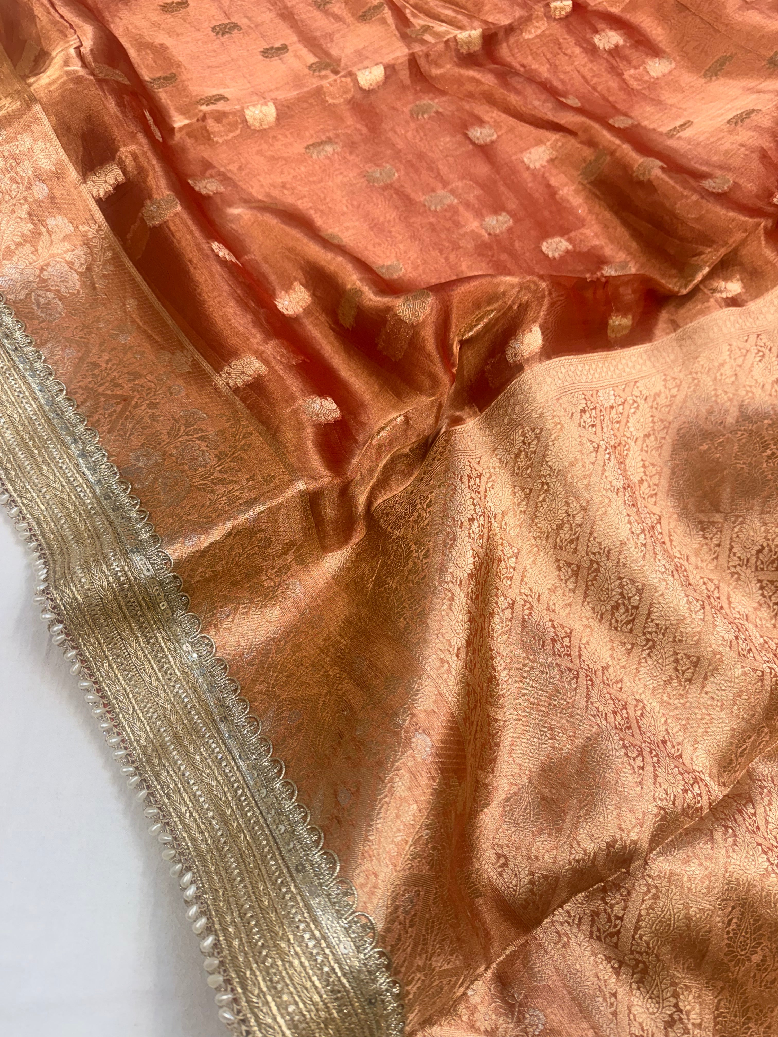 Rust red tissue silk kadhwa buti gotapatti saree