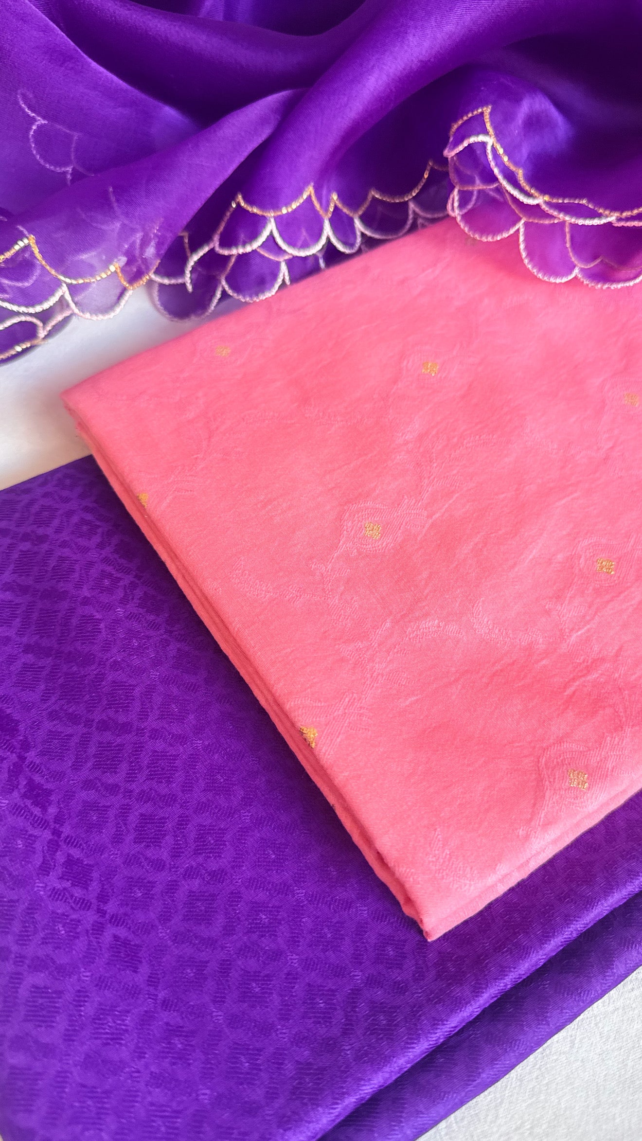 Summer suits under 8k - Mul cotton peach kurta paired with purple scalloped kora silk duppata