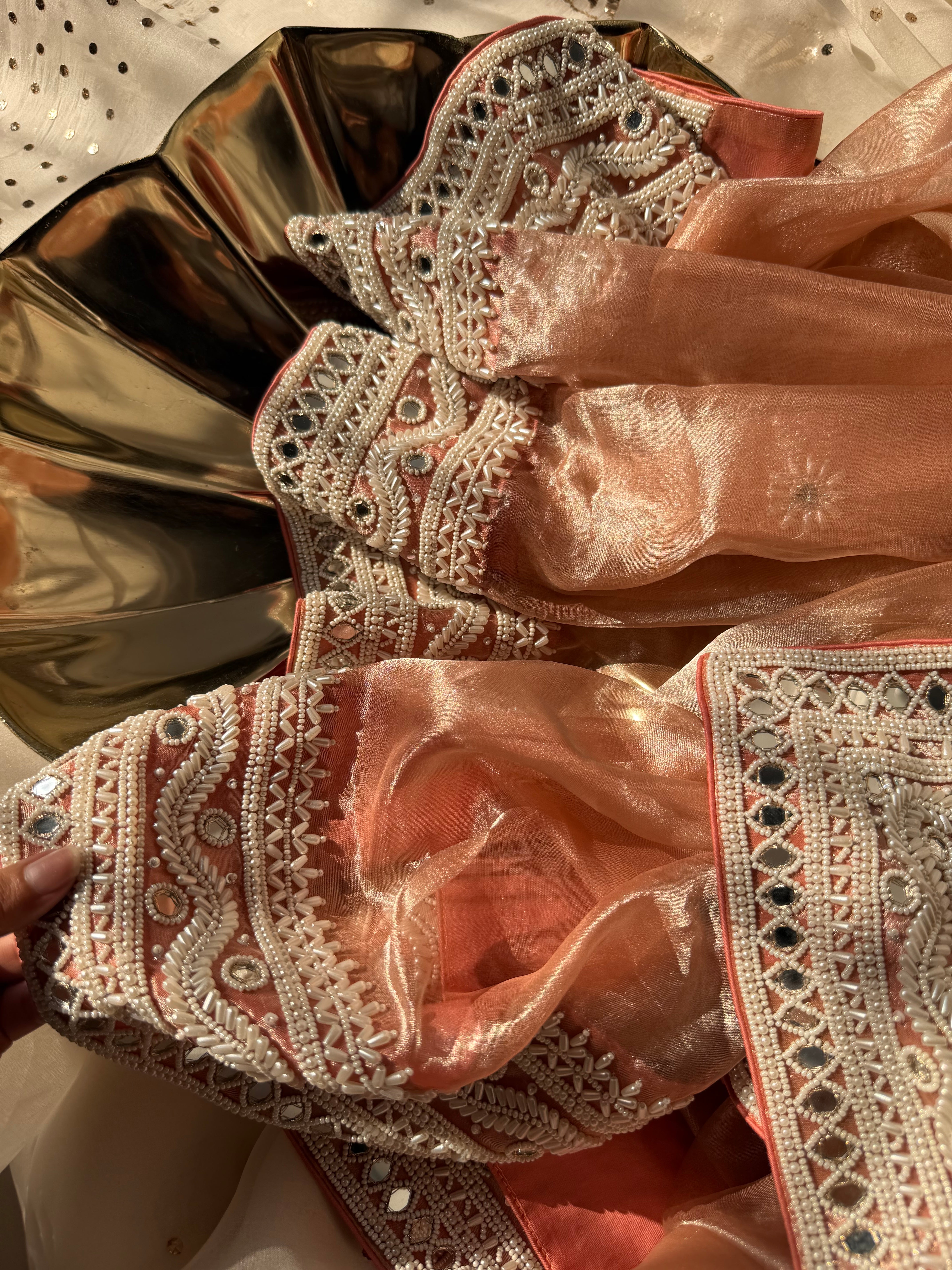 Gajri peach mirrorwork and pearlwork hand embroidered diamond tissue saree
