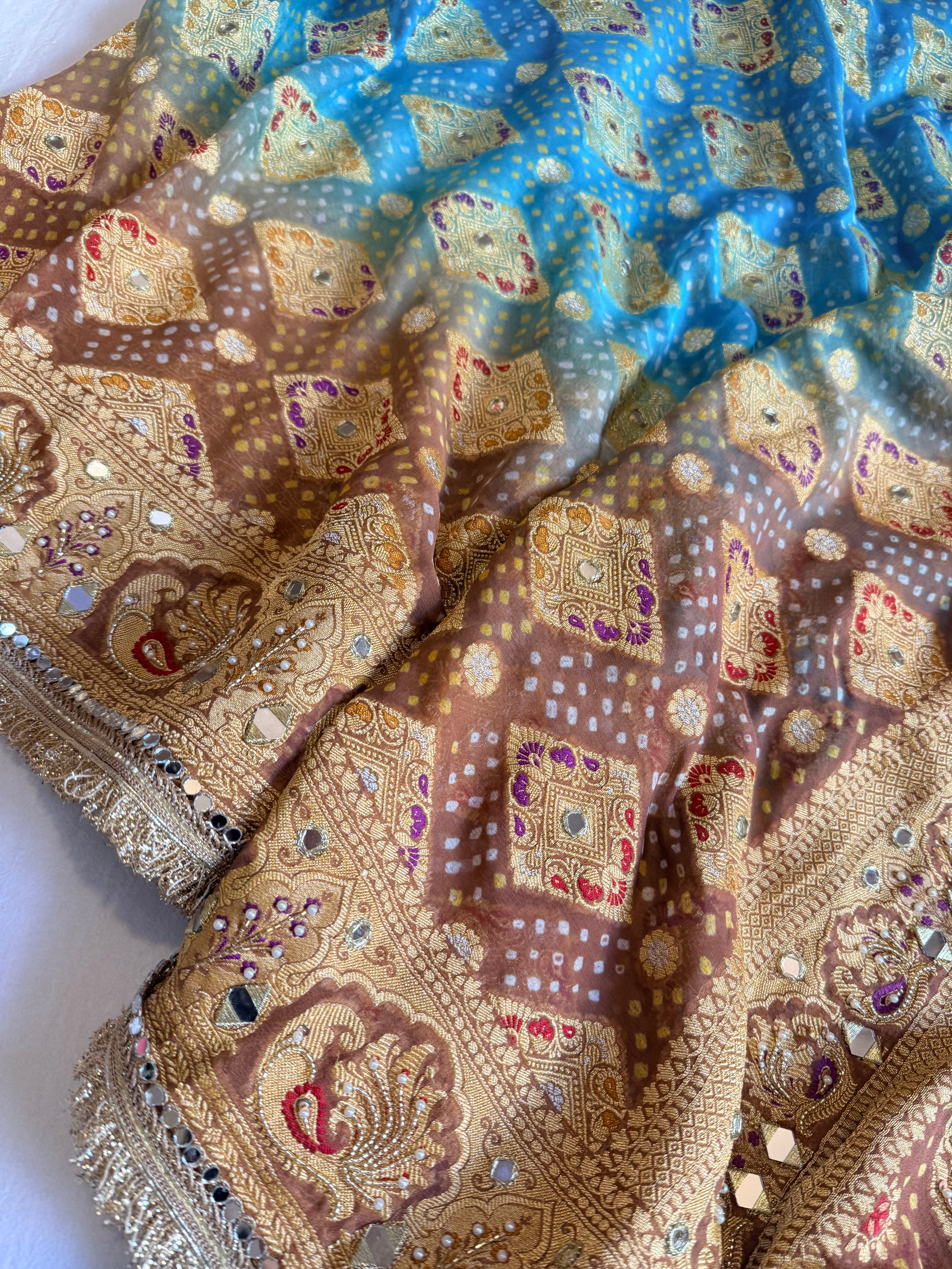Banarasi blush shades of chiffon rai bandhej mirror work hand embroidered saree