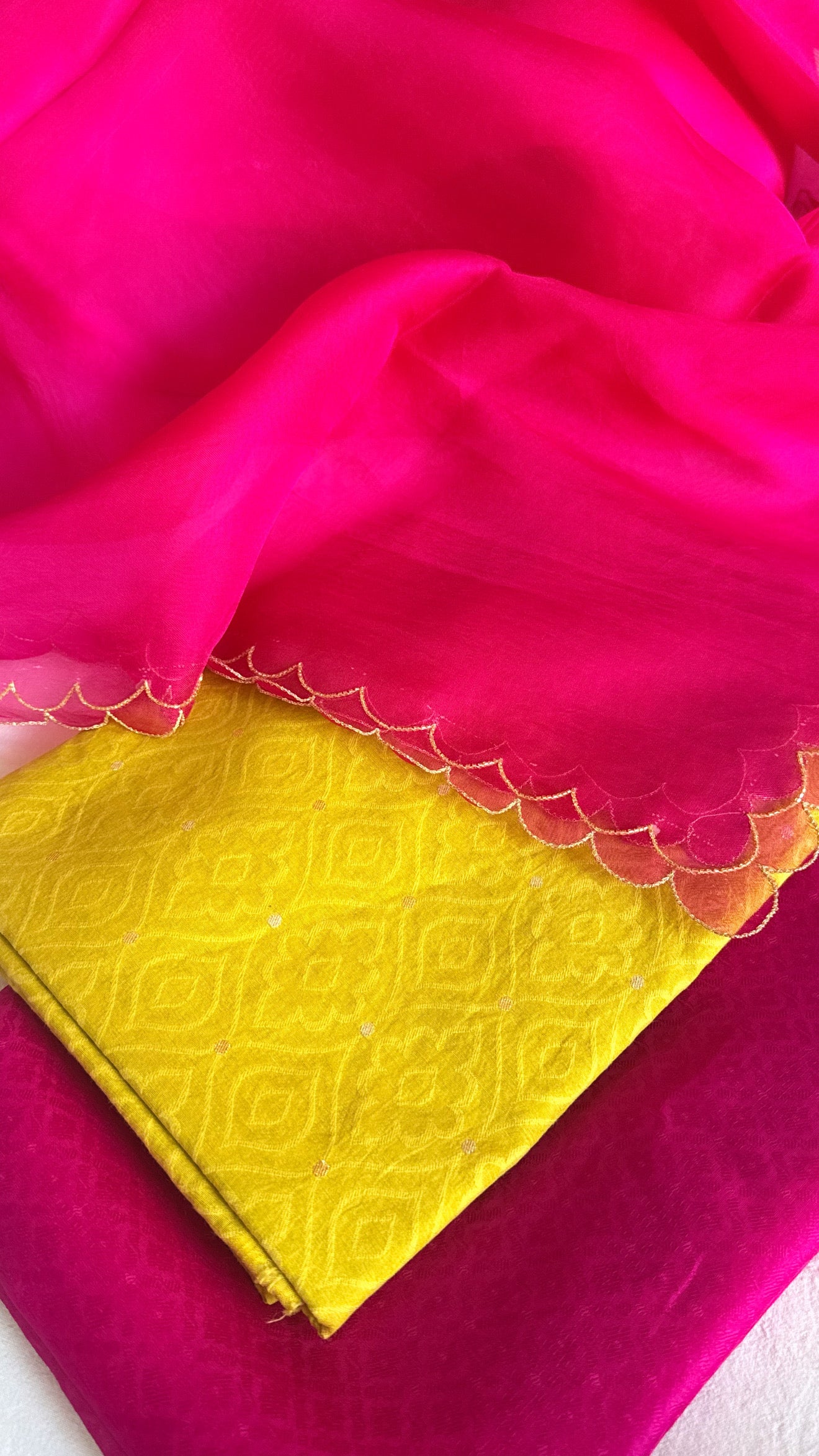 Summer suits under 8k - Mul cotton yellow kurta paired with rani scalloped kora silk duppata
