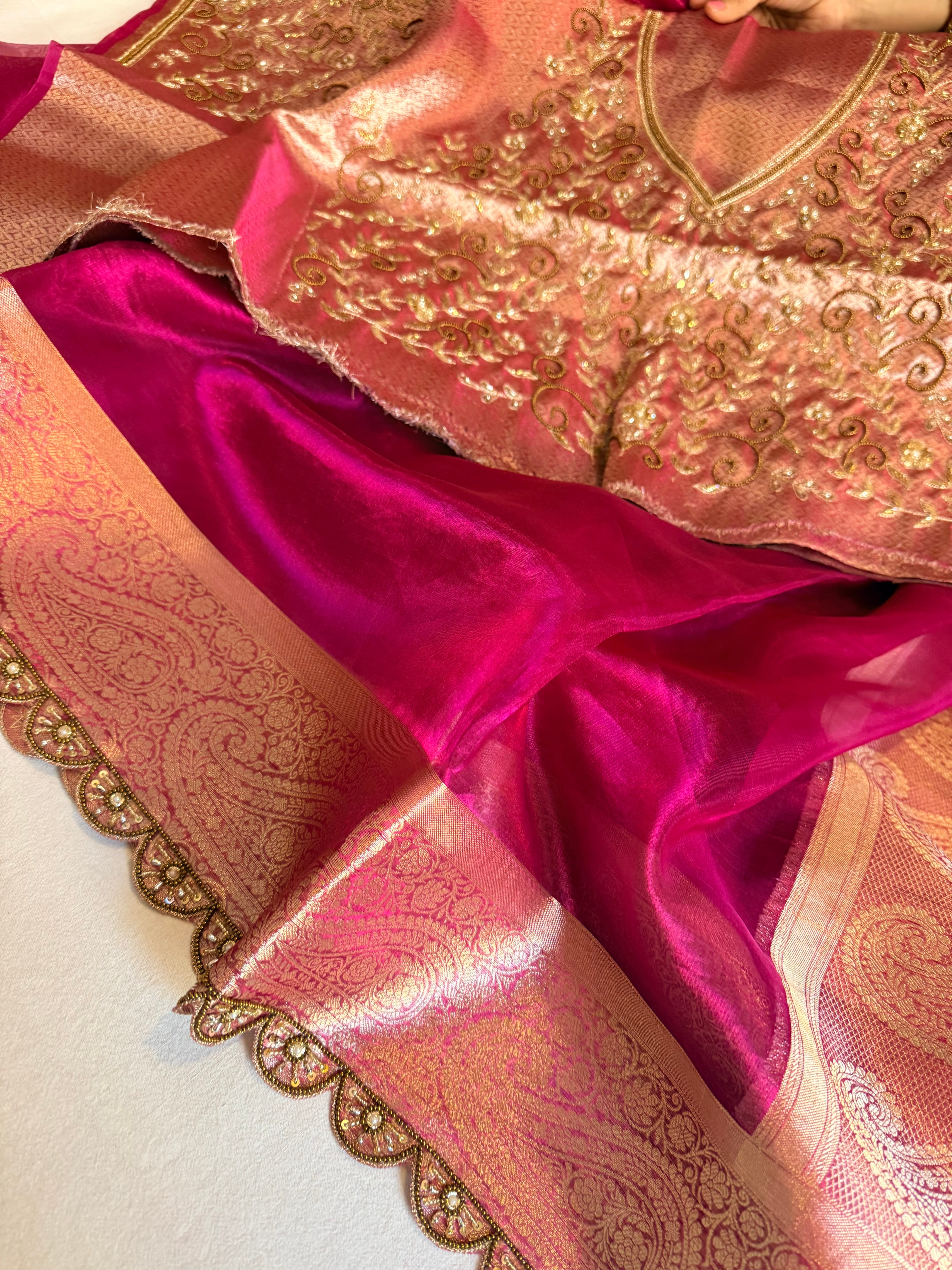 Metallic rani pink husn tissue silk hand embroidered saree with heavy blouss