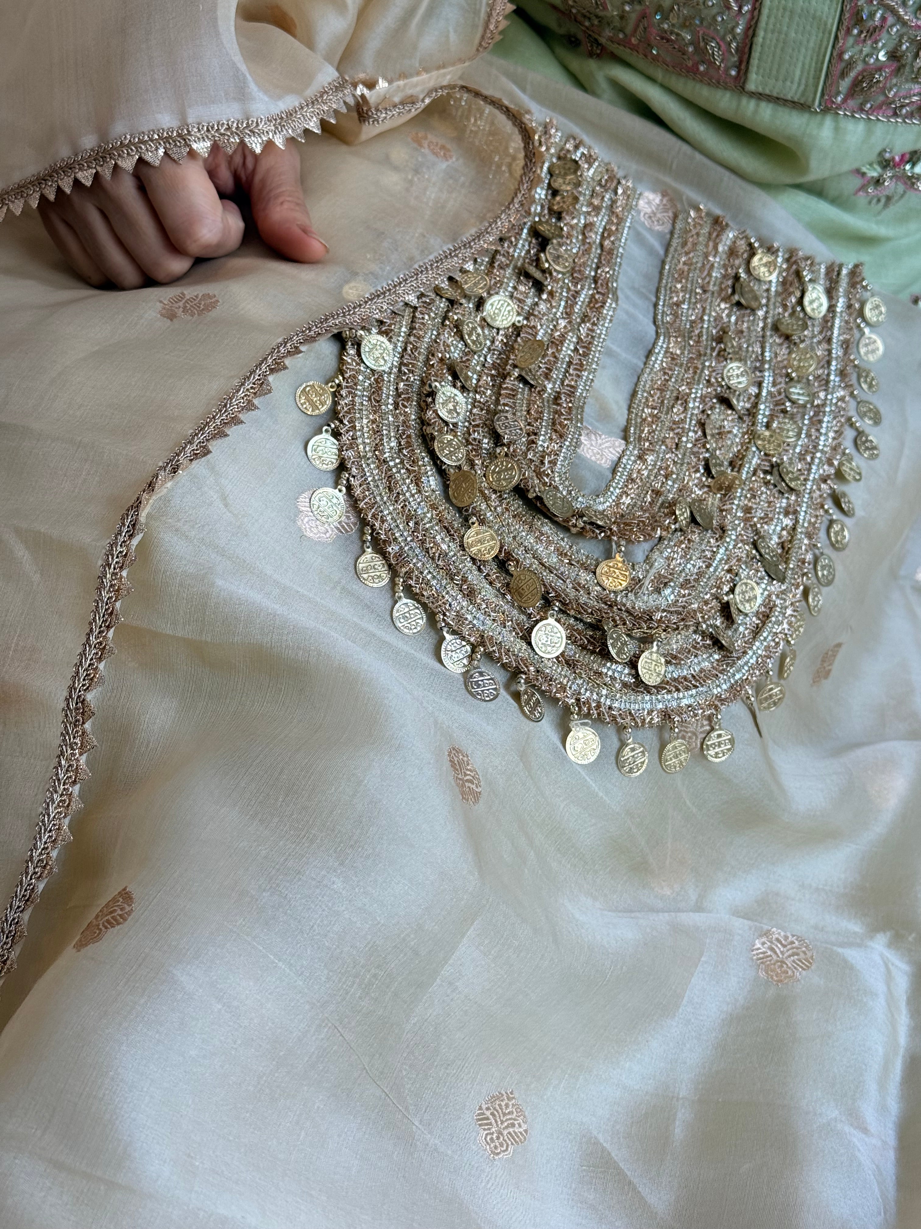 Coinwork banarasi kora silk kadhwa buti champagne gold suit set