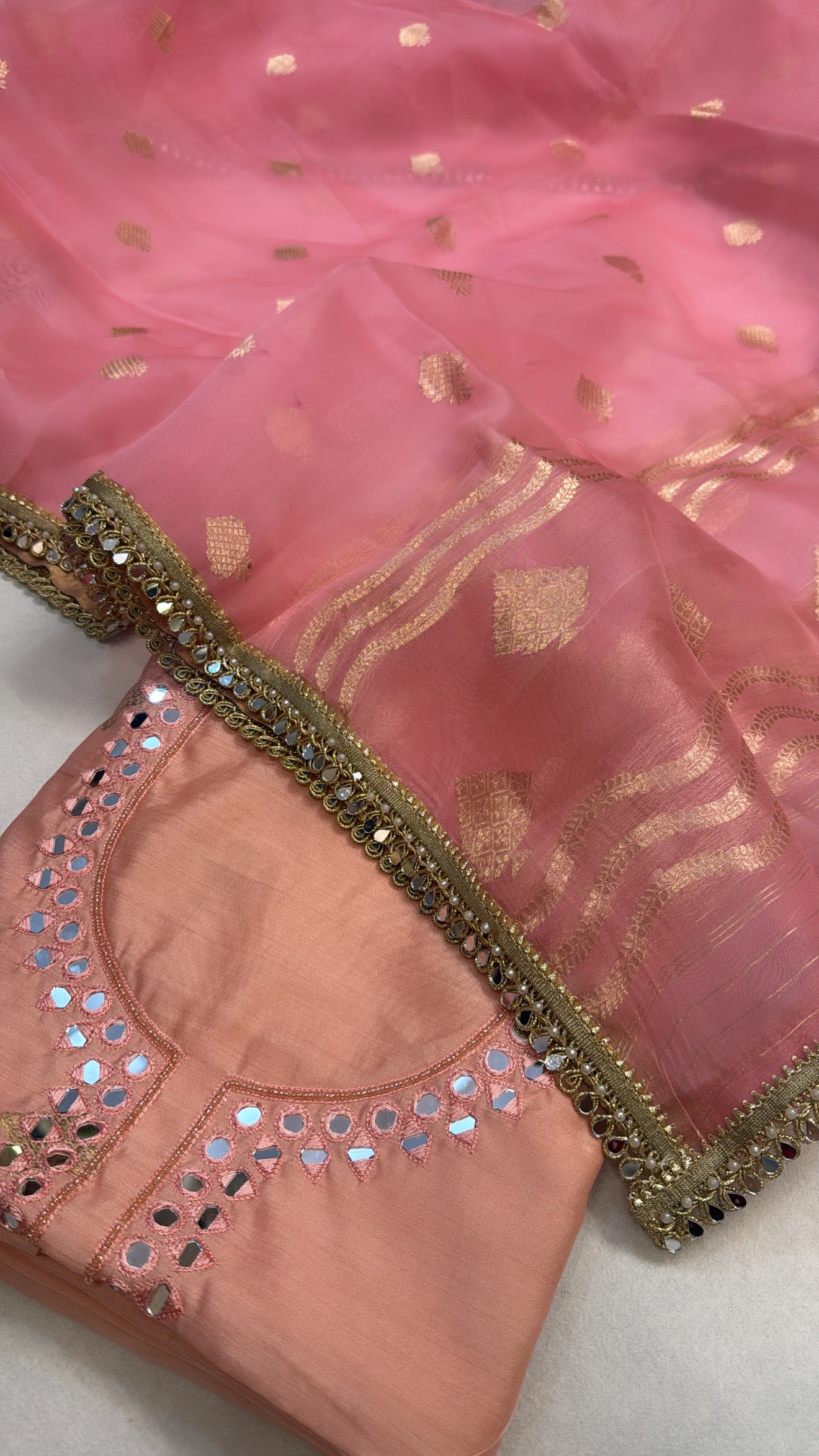 Peachy pink chiniya silk kadhwa kurta paired with kora silk kadhwa duppata