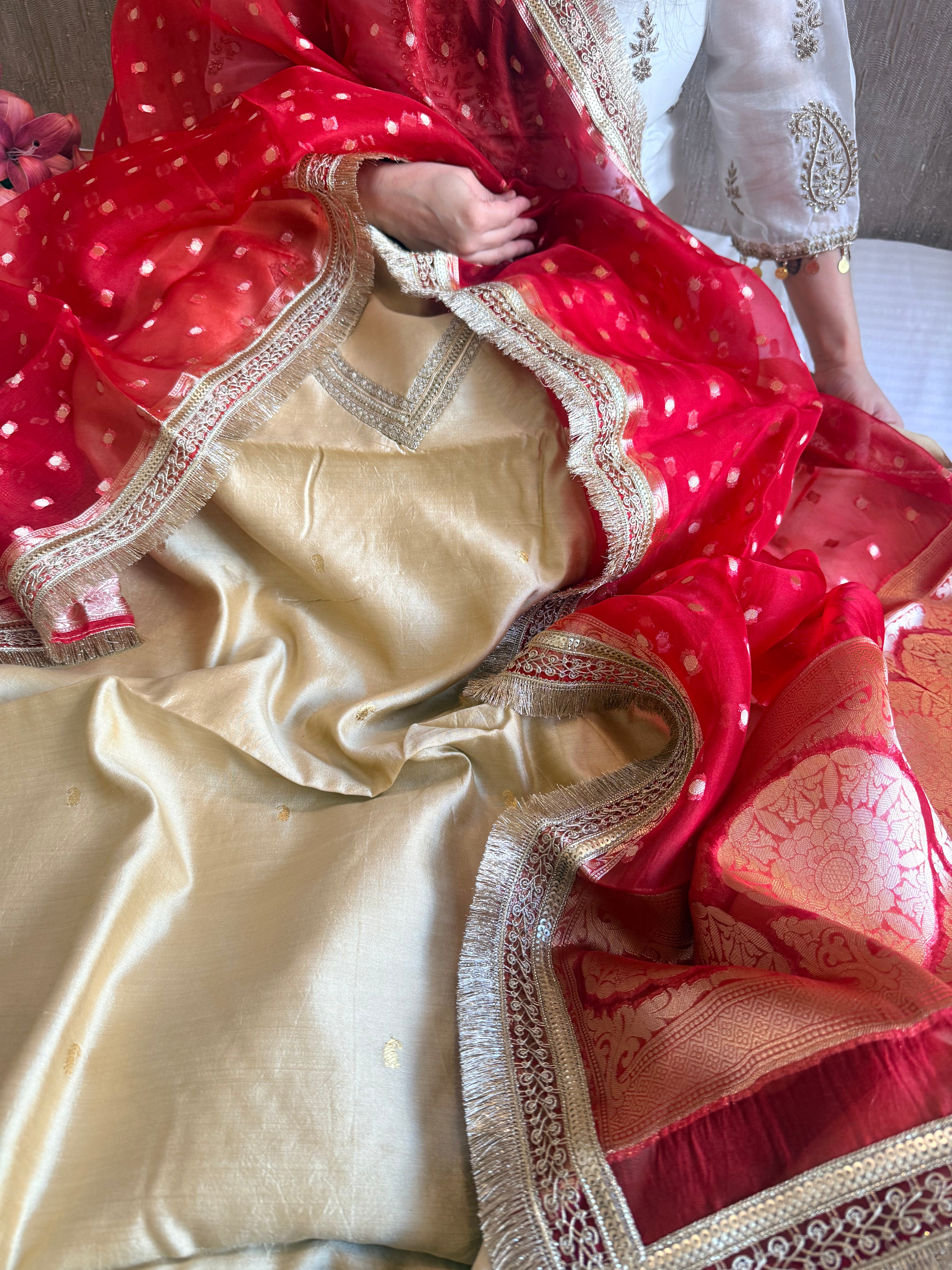 Beige-red chiniya silk kadhwa buta kurta paired with kora silk red duppata