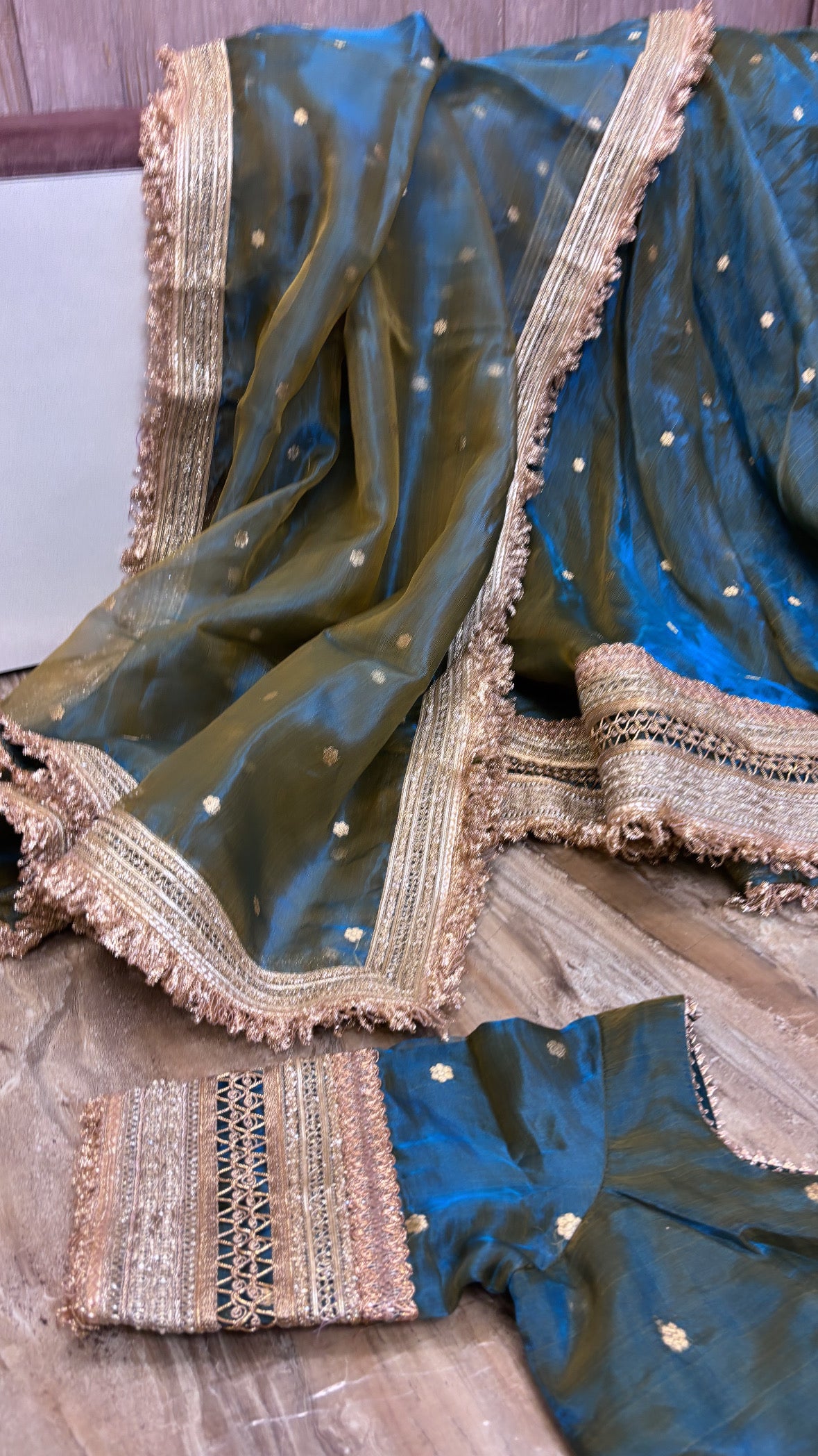 Mastani coral blue-olive tissue silk kadhwa buti dhup chao effect lehenga set