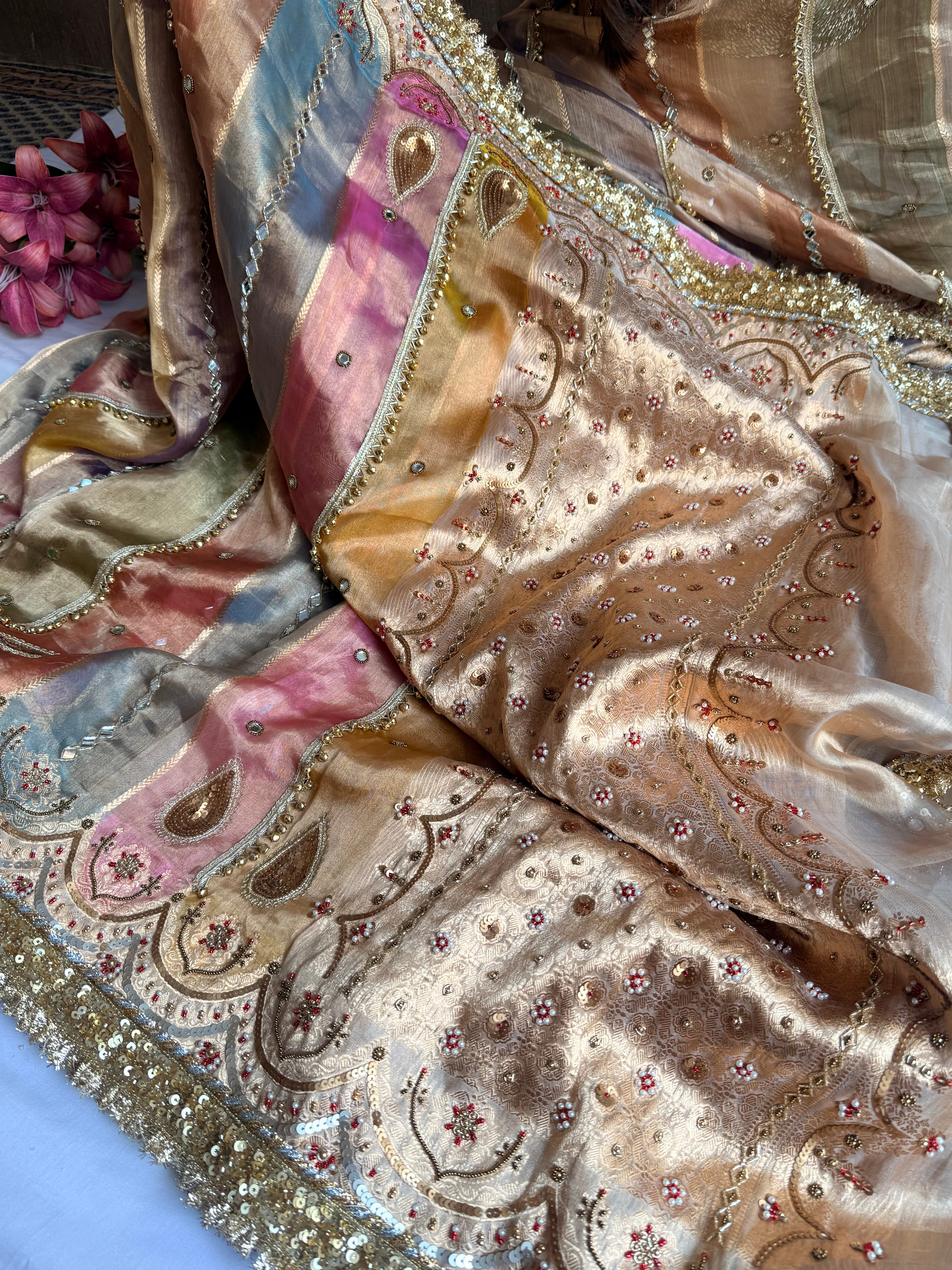 Navratan edit tissue silk rangkaat and ghungroo work hand embroidered saree