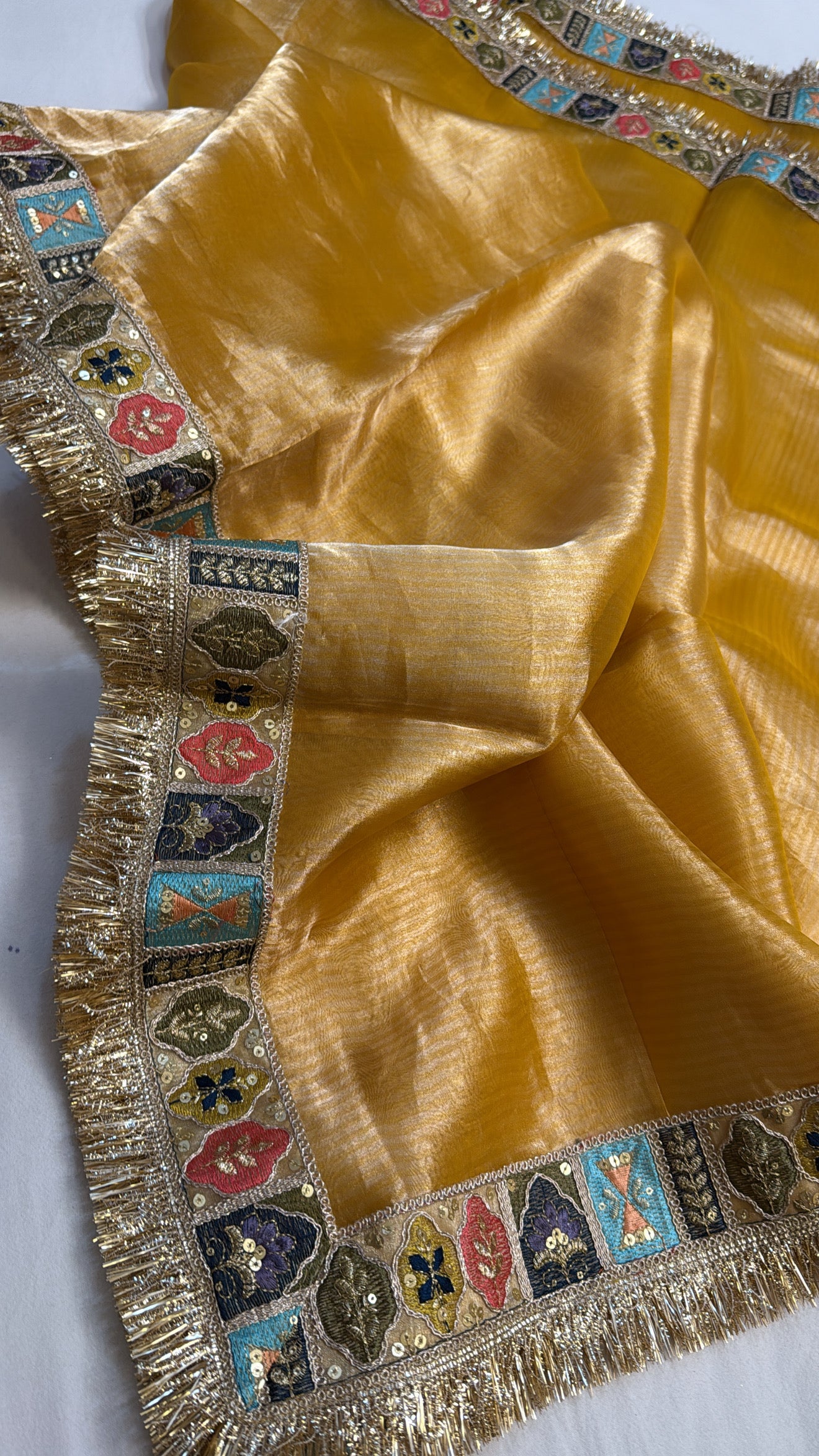 Haldi yellow tissue silk kadhwa meenakari border saree