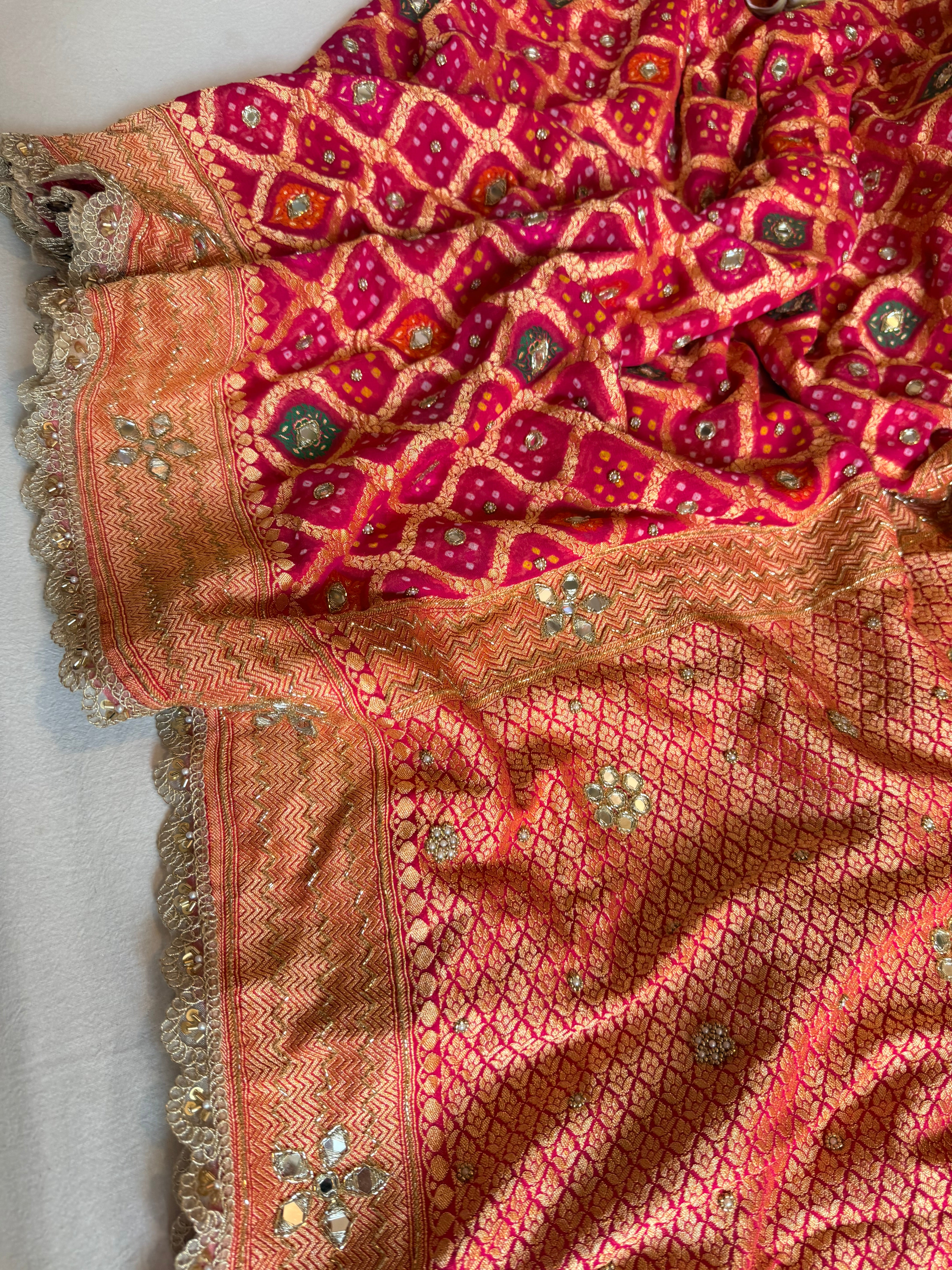 Banarasi chiffon gorgette rai bandhej kadhwa weaving hand embroidered saree