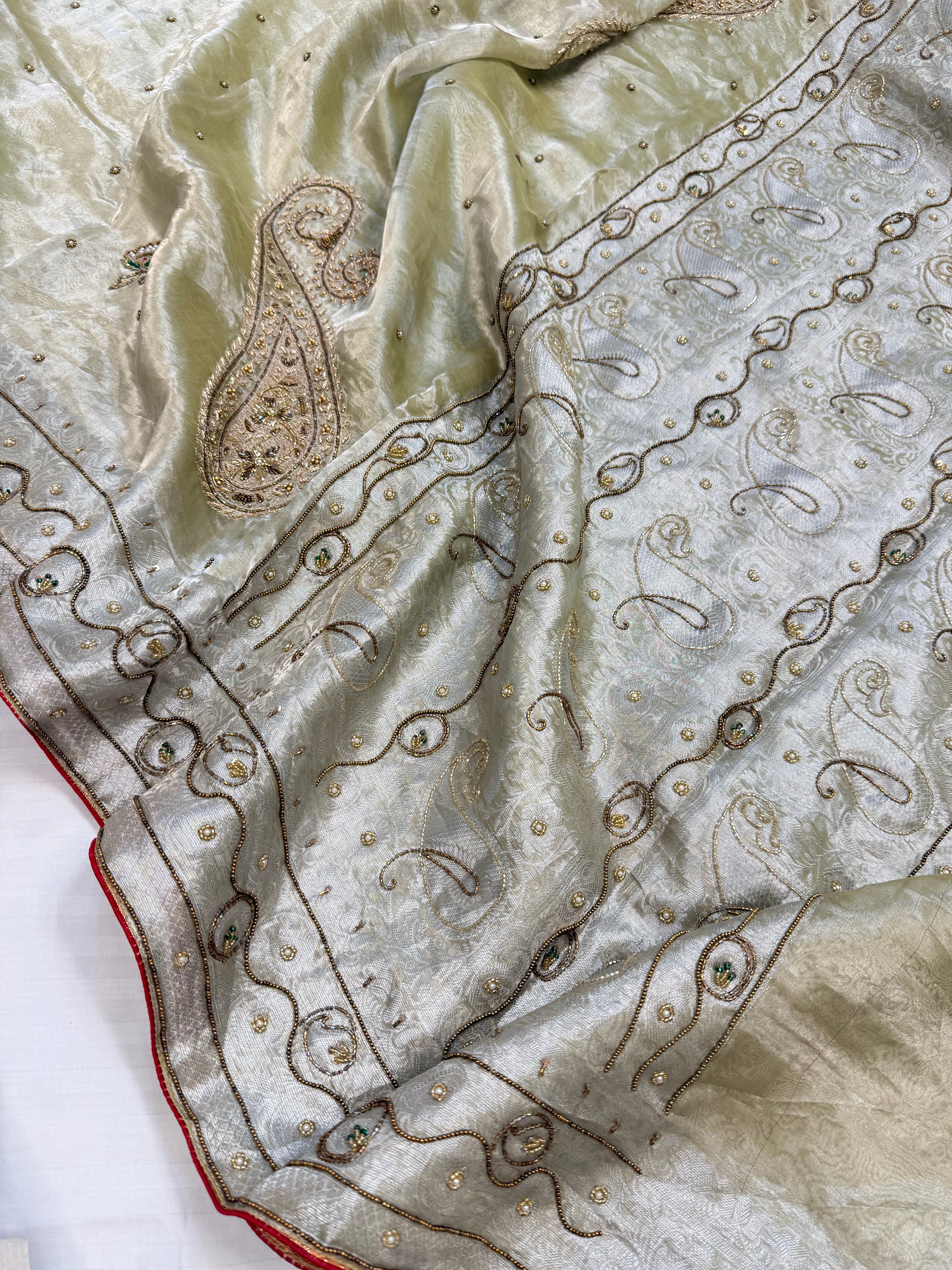 Mint green husn tissue silk meenakari hand embroidered kadhwa saree