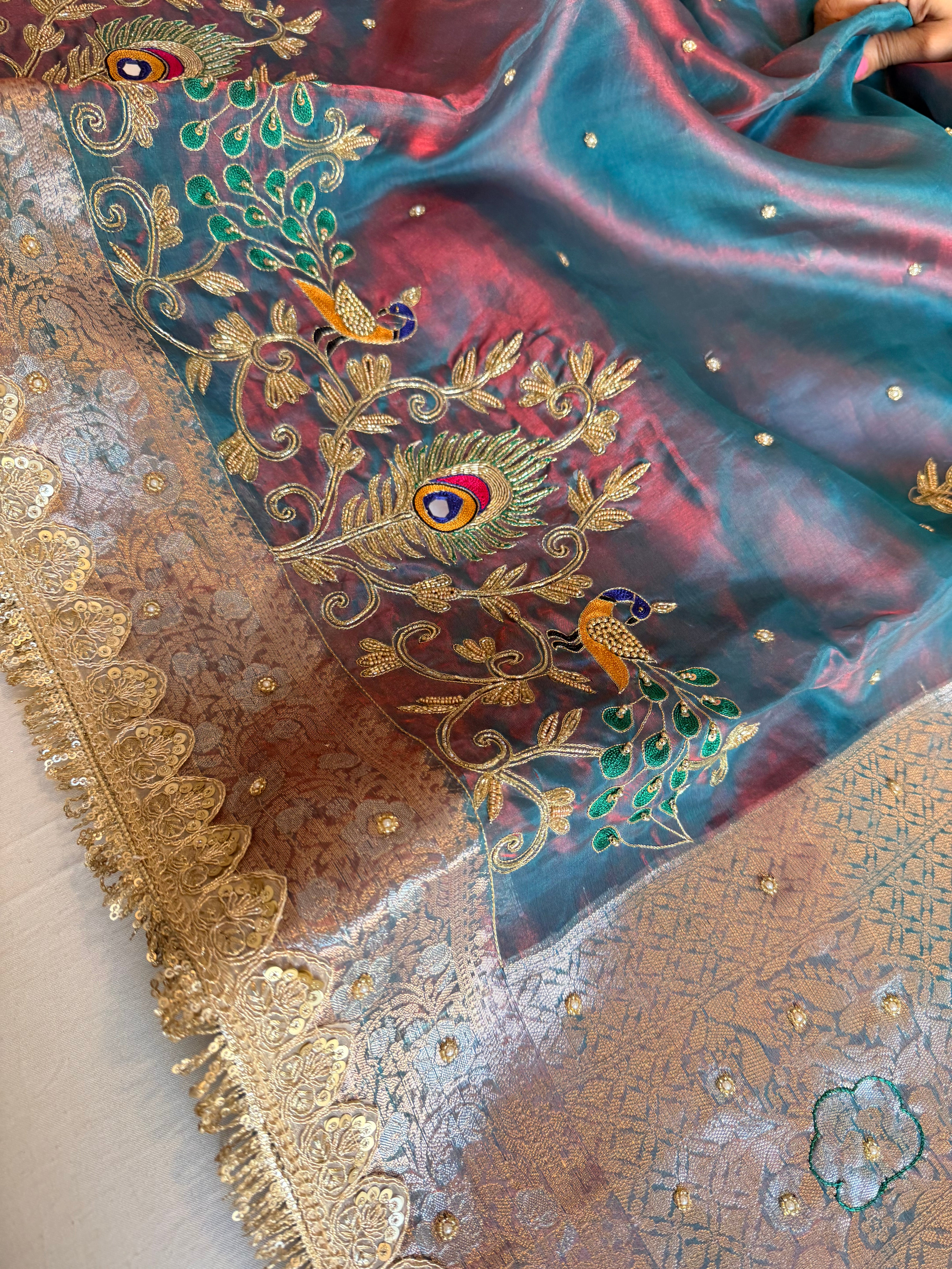 Morpankh motif husn dhup chao effect tissue silk hand embroidered kadhwa saree