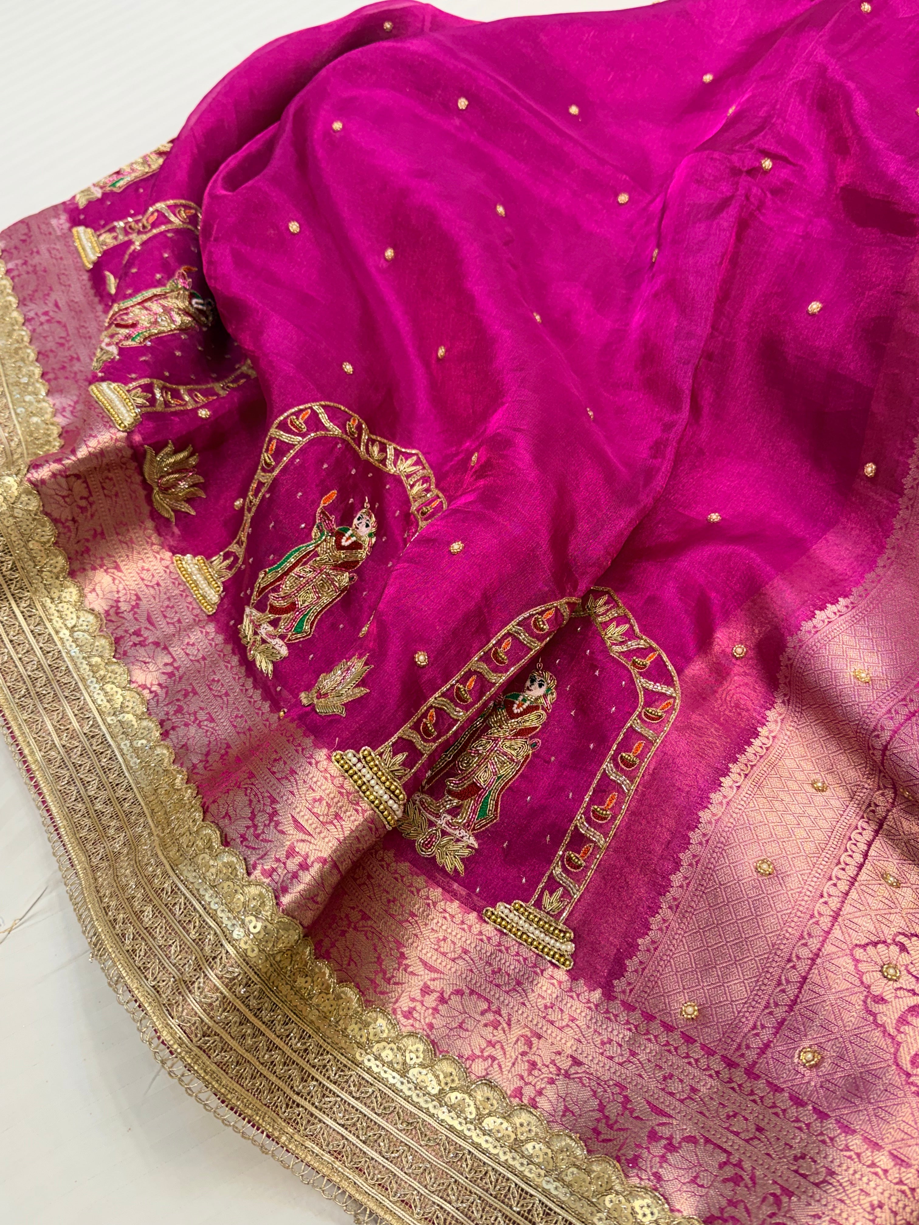 Rani pink husn tissue silk krishna motif hand embroidered saree
