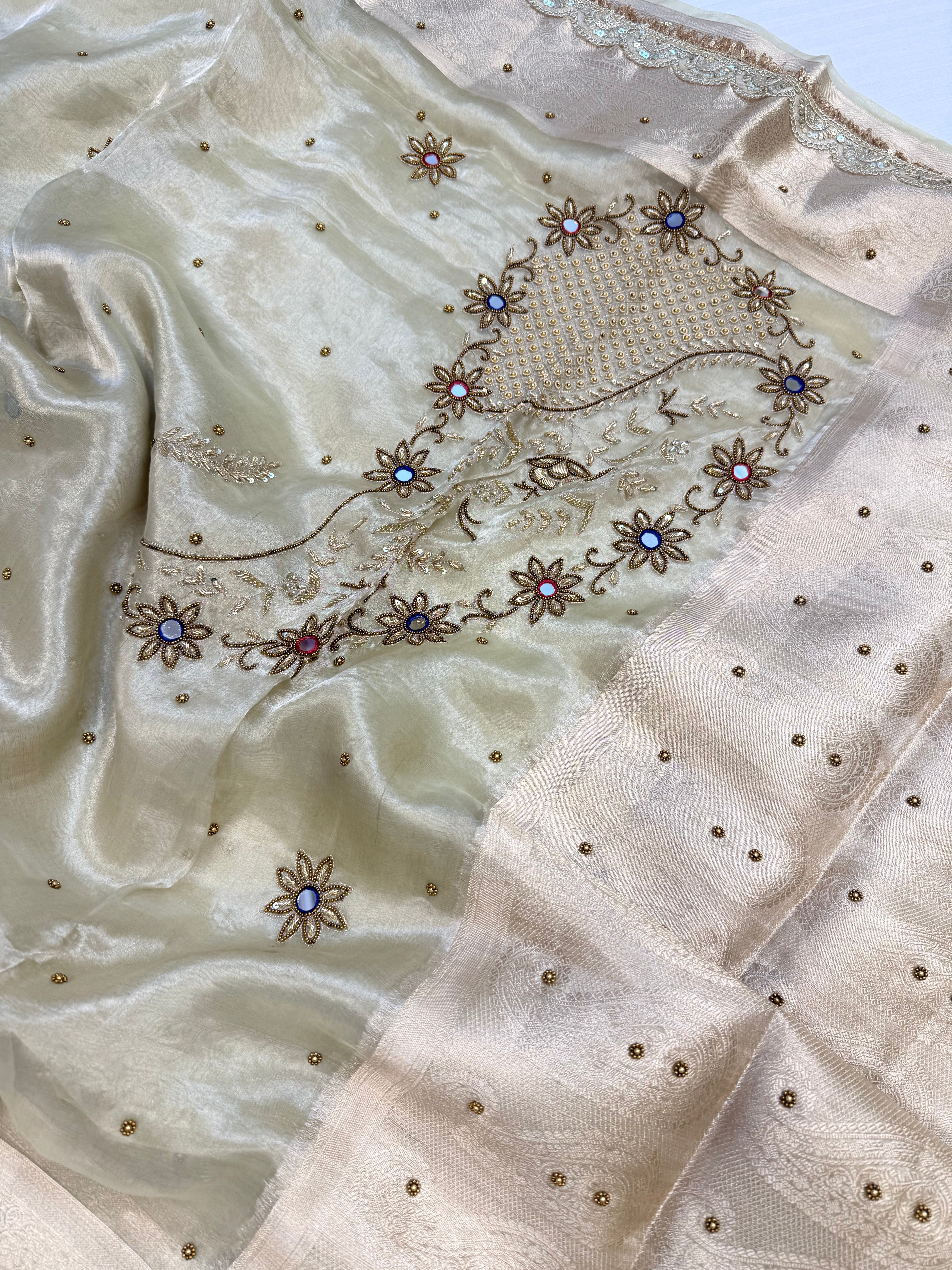Mint green husn tissue silk carry motif hand embroidered saree
