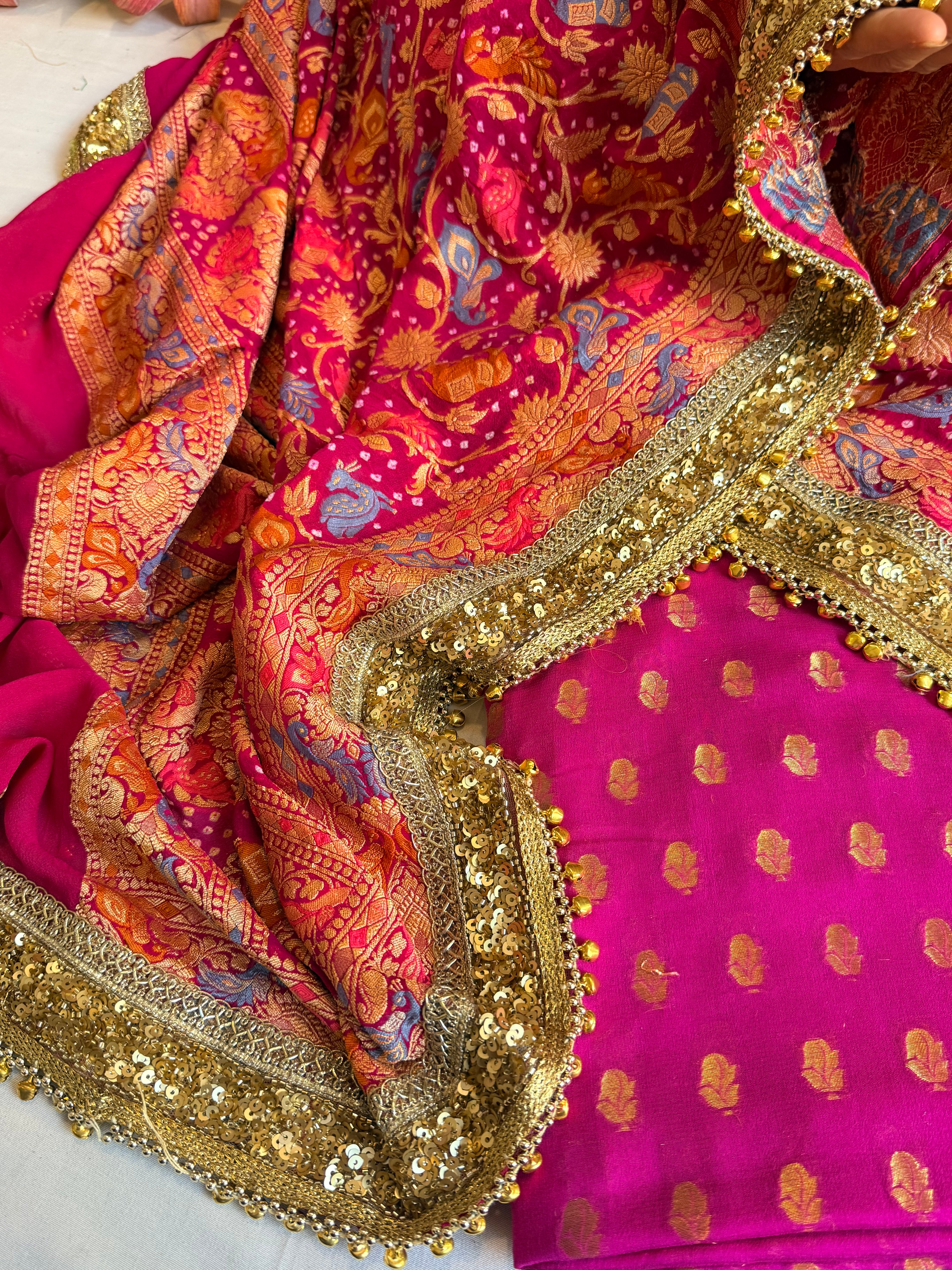 Banarasi hot pink bandhej ghungroo and sequin work chiffon gorgette kadhwa suit set