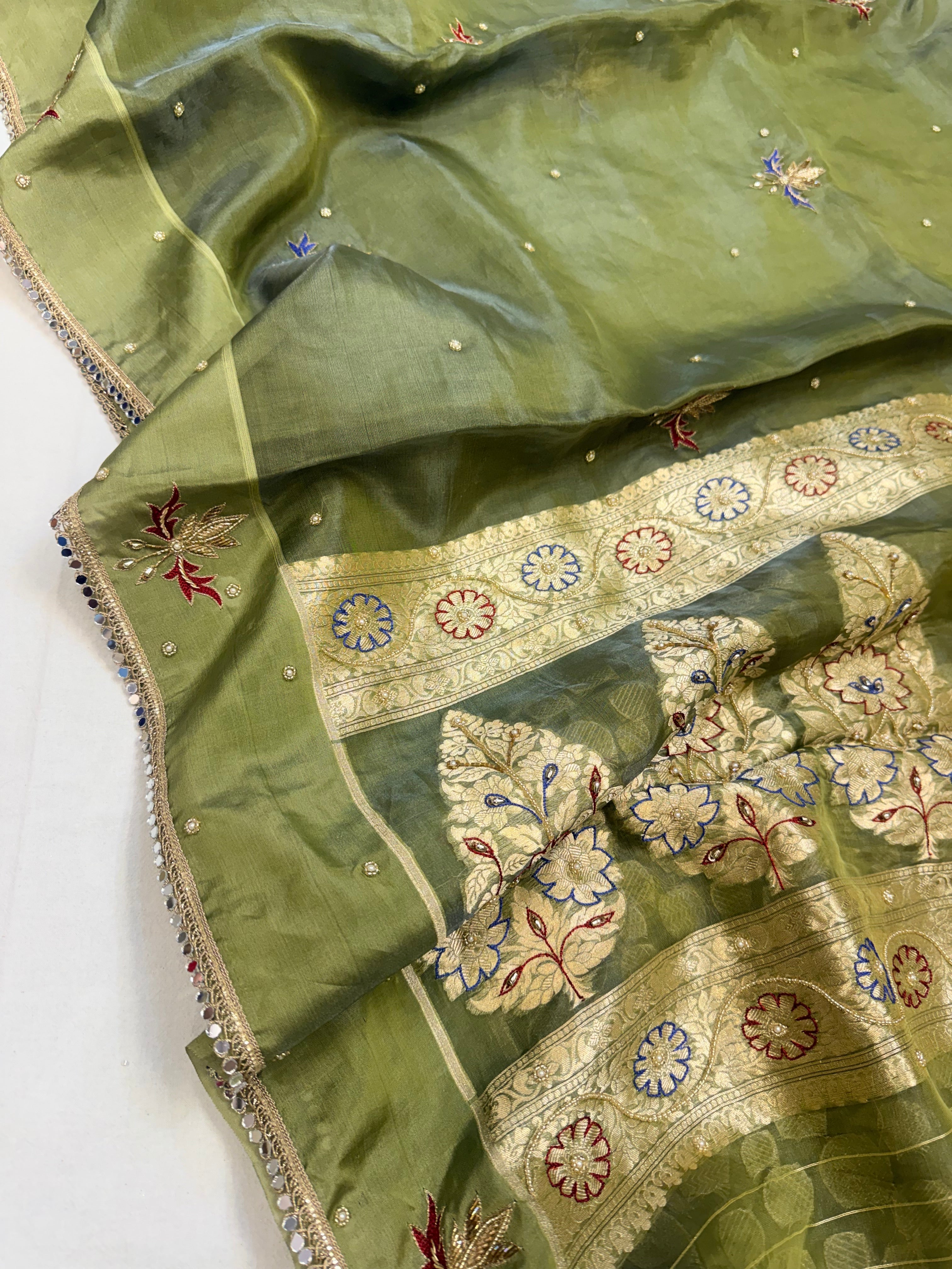 Parrot green tissue silk hand embroidered kadhwa saree