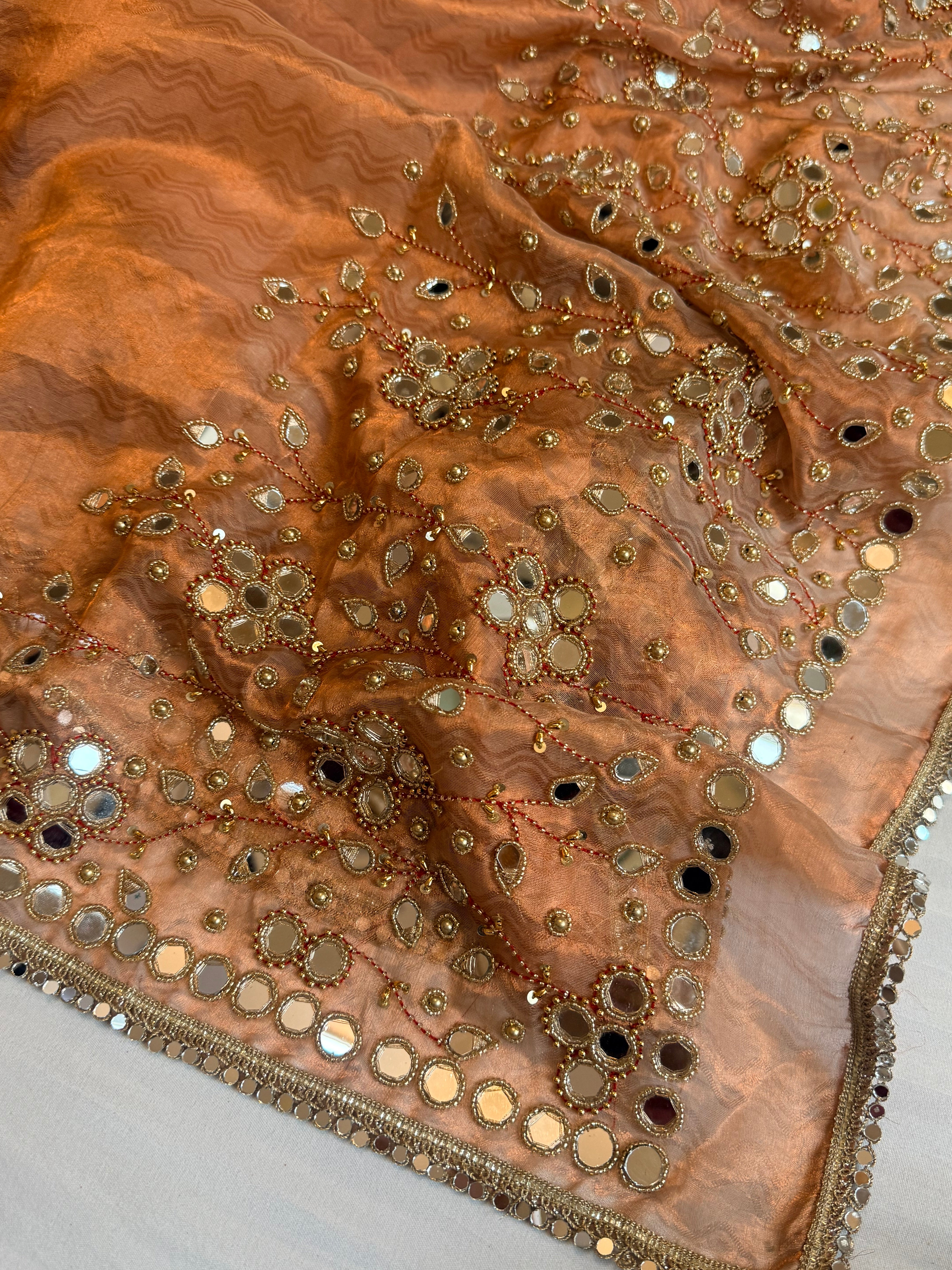 Mirrorwork & Jadauwork border tissue silk hand embroidered kadhwa copper saree