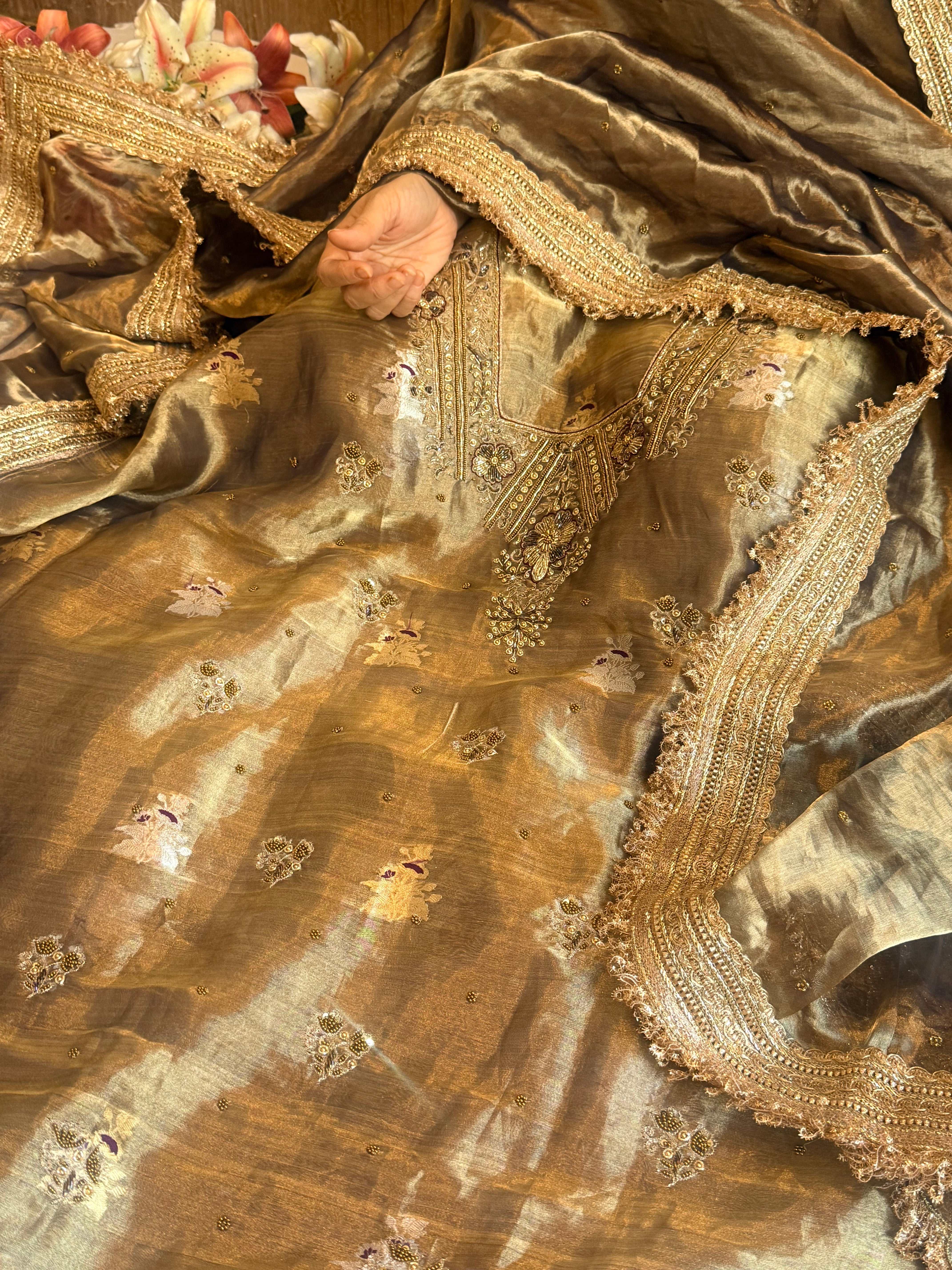 Molten gold tissue silk banarasi hand embroidered kadhwa suits