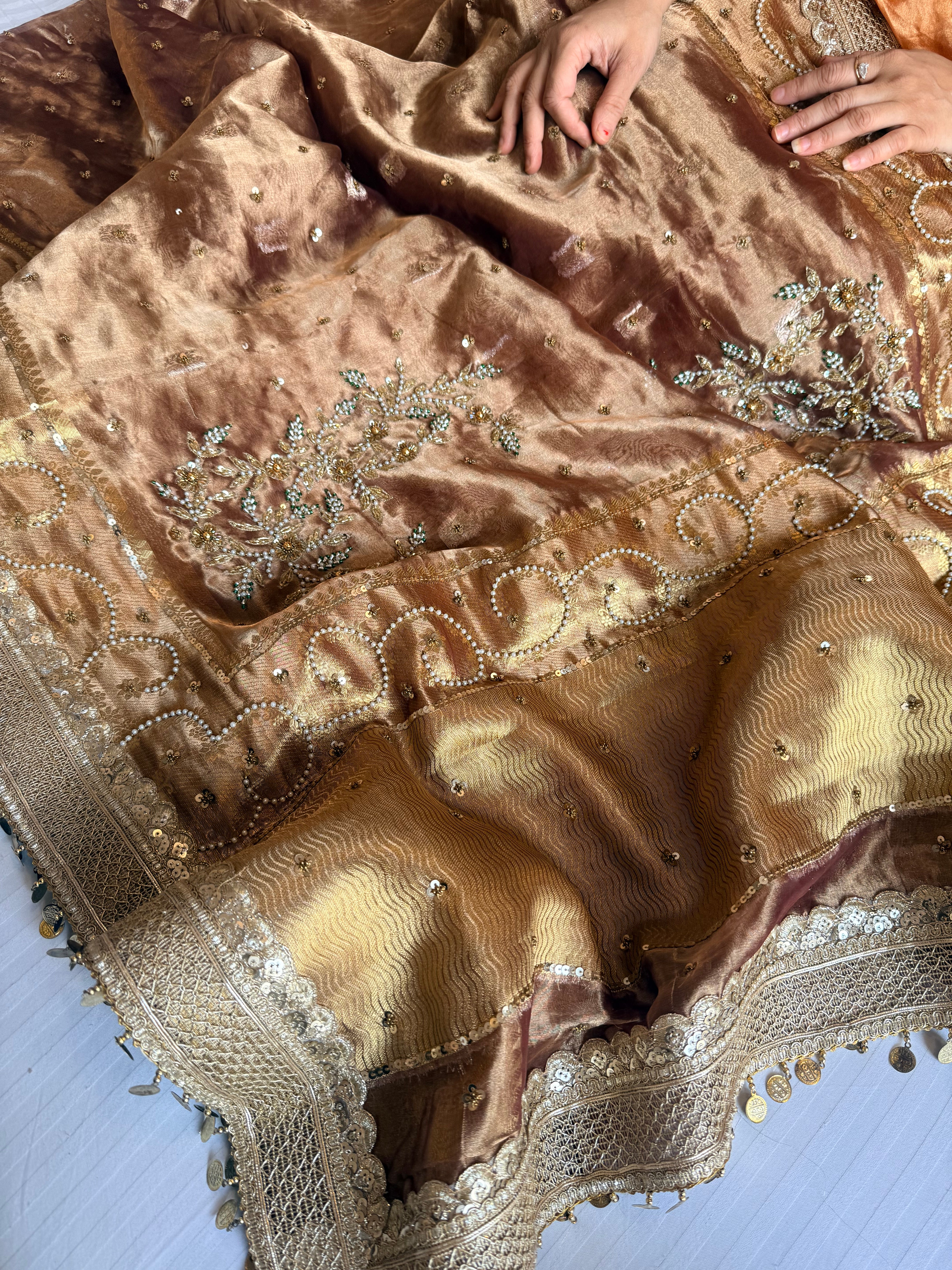 Salma-sitara molten brown tissue silk antique work hand embroidered saree