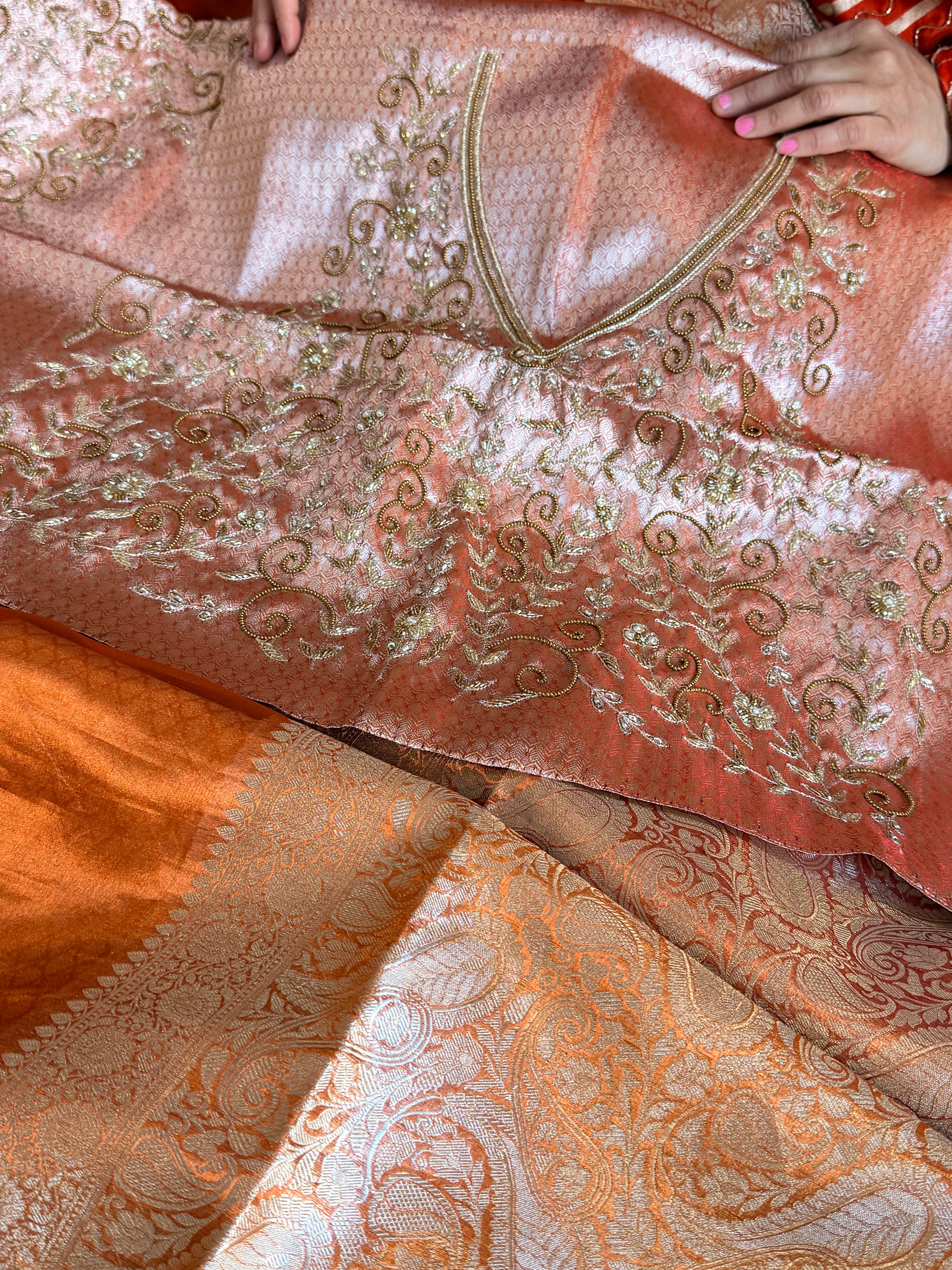 Metallic orange husn tissue silk hand embroidered saree with heavy blouse