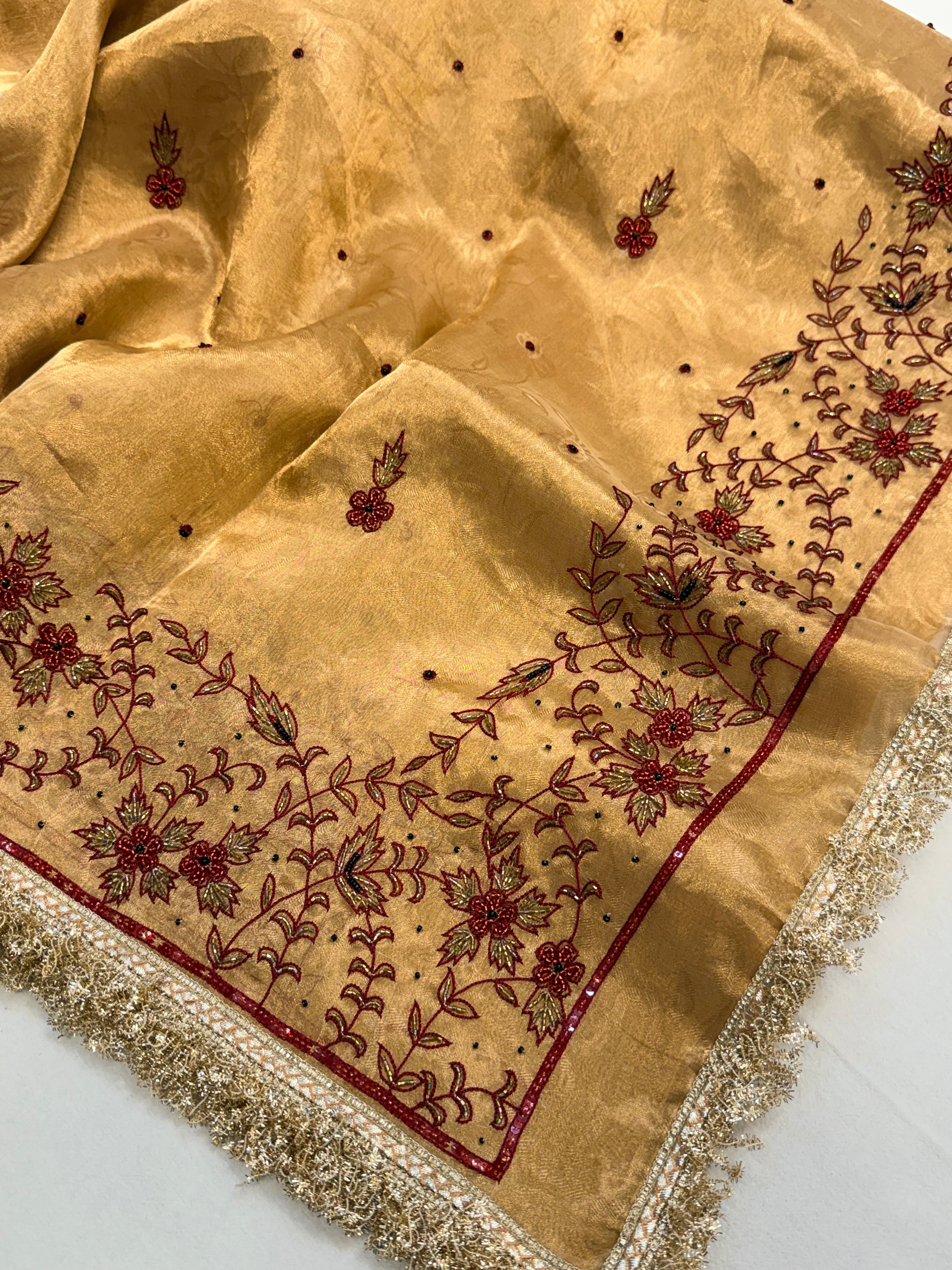 Molten gold tissue silk hand embroidered kadhwa saree