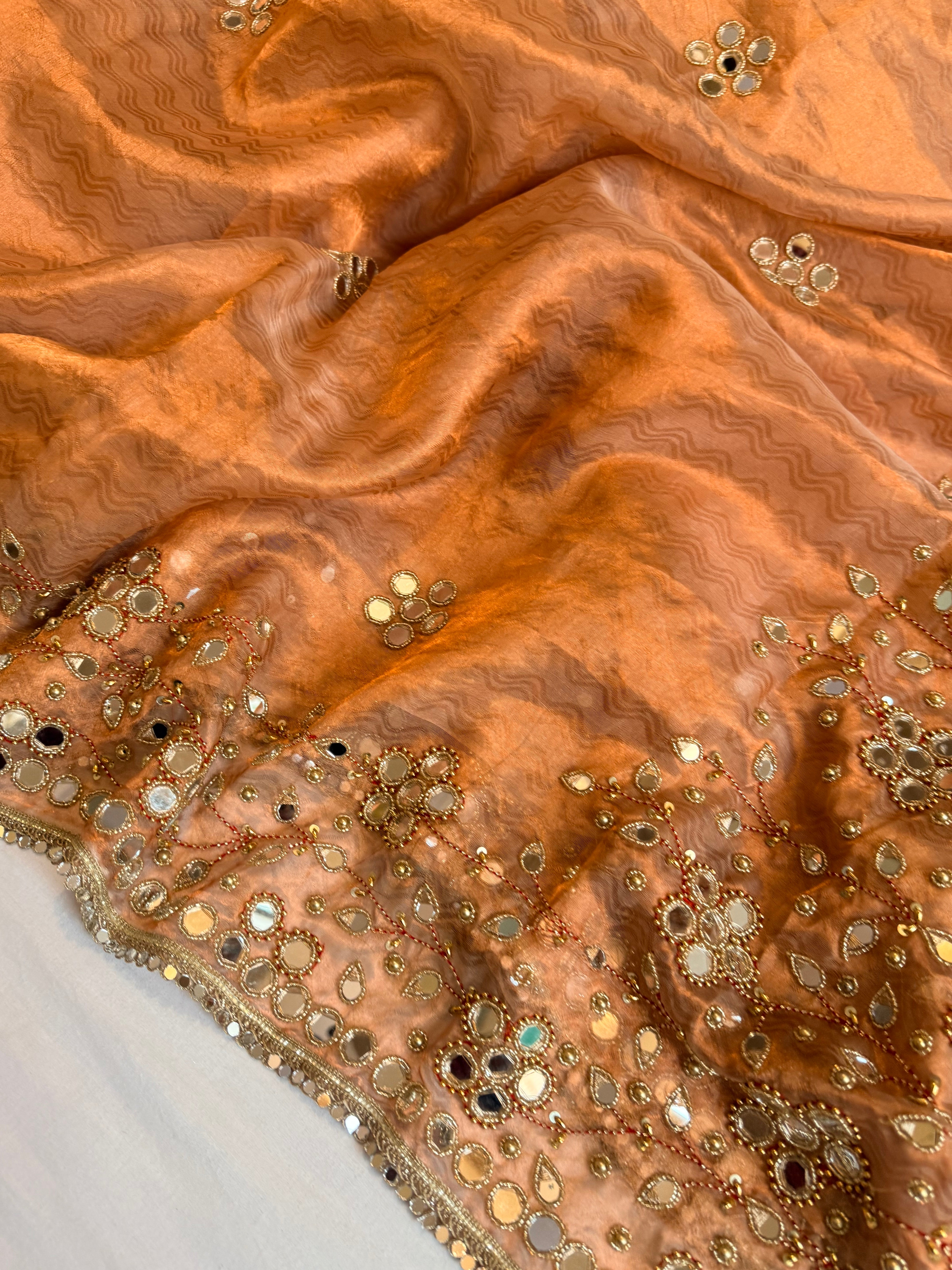 Mirrorwork & Jadauwork border tissue silk hand embroidered kadhwa copper saree