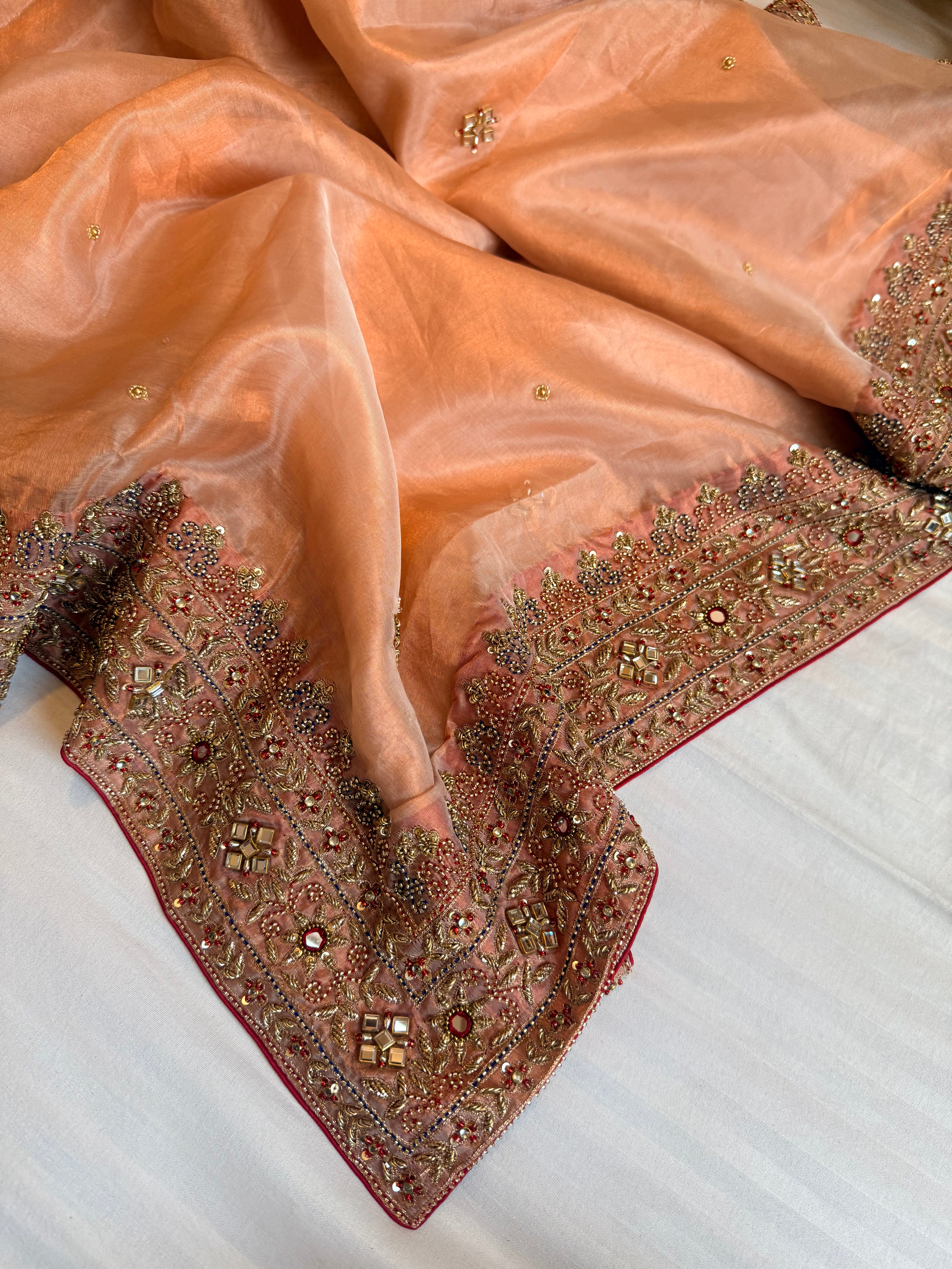 Zardozi & Jadauwork border tissue silk hand embroidered kadhwa copper saree