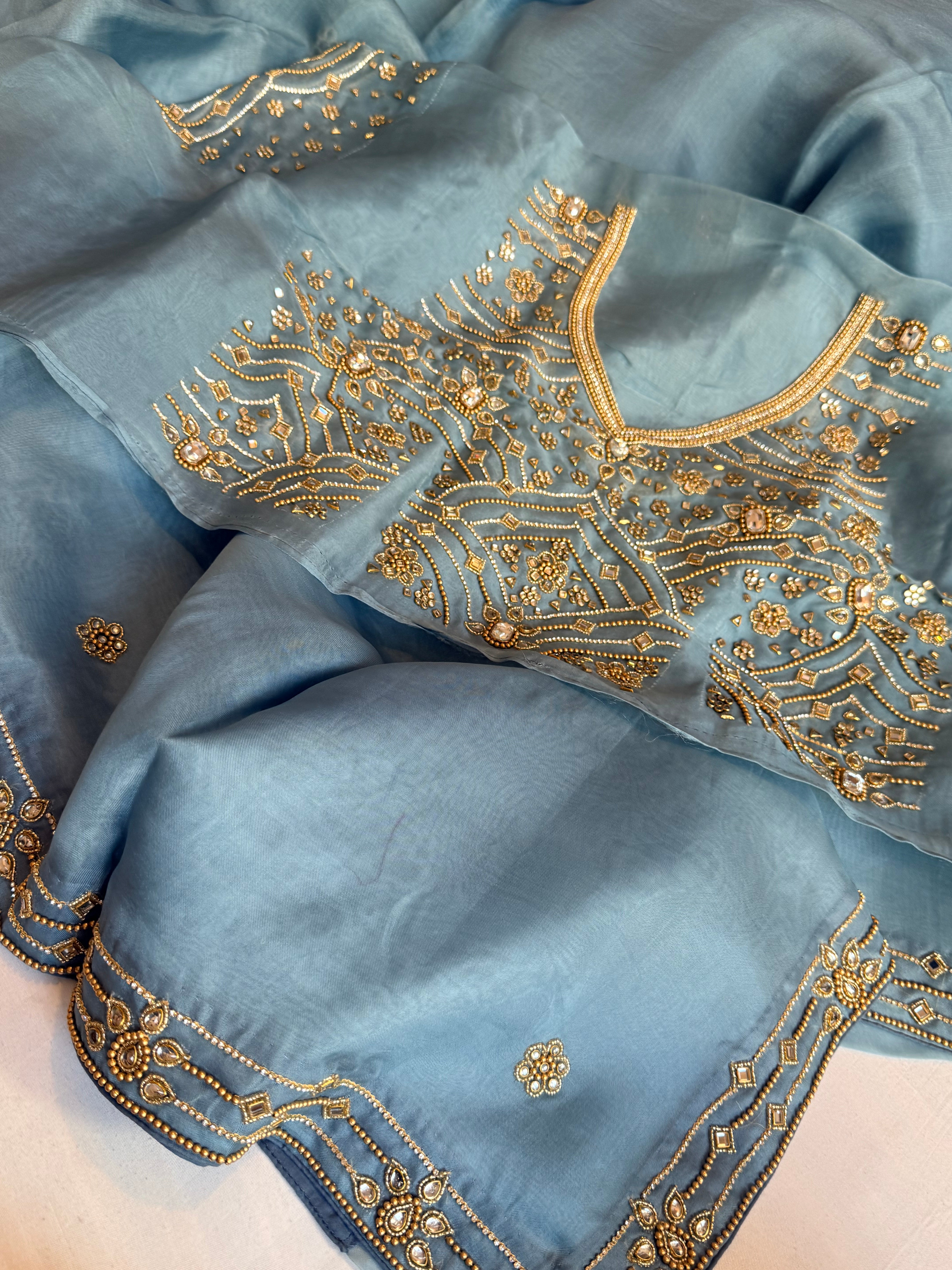 Banarasi icey blue kora silk polki hand embroidered kadhwa saree