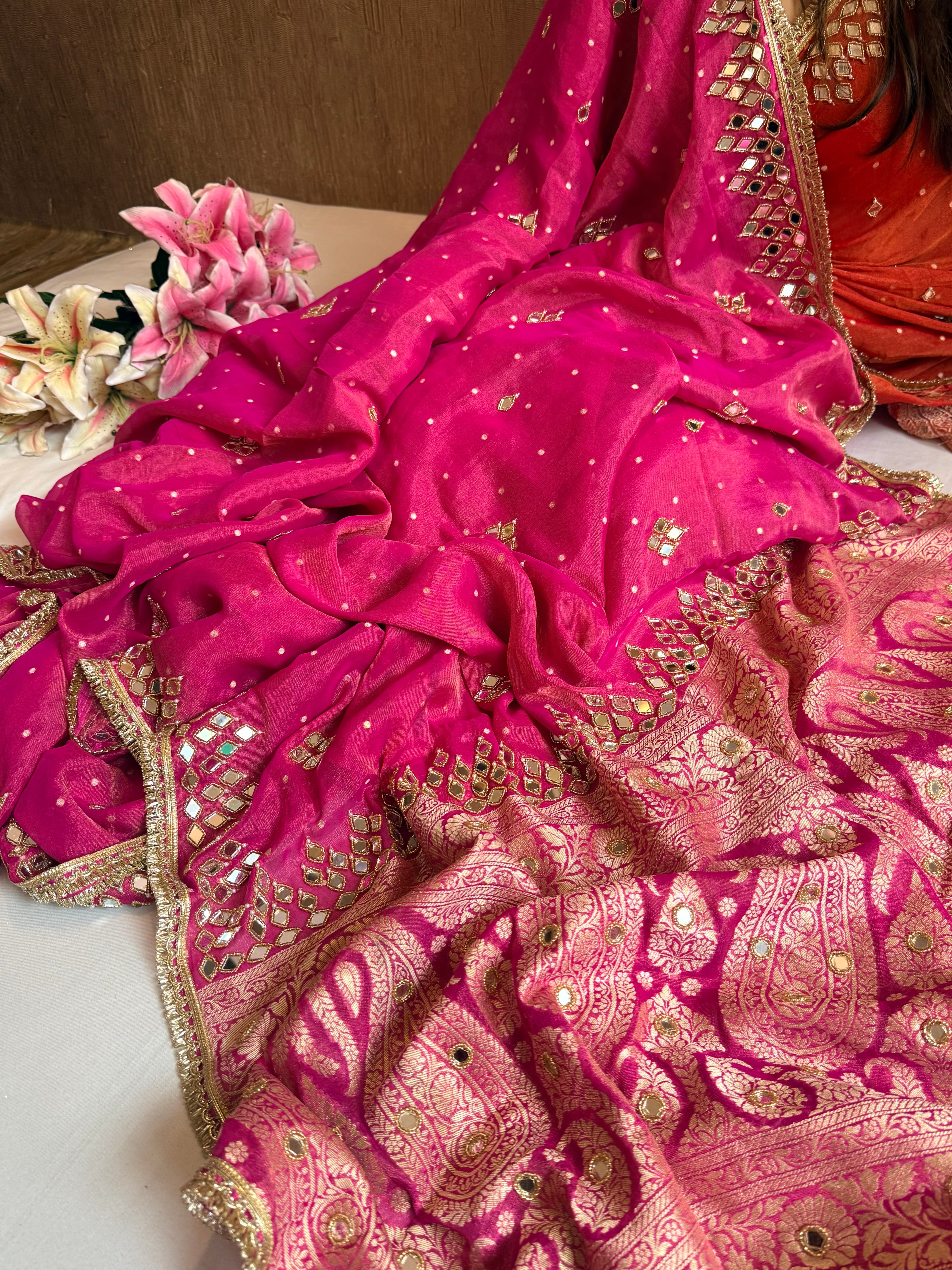 Hot pink tissue gorgette mirror work hand embroidered saree