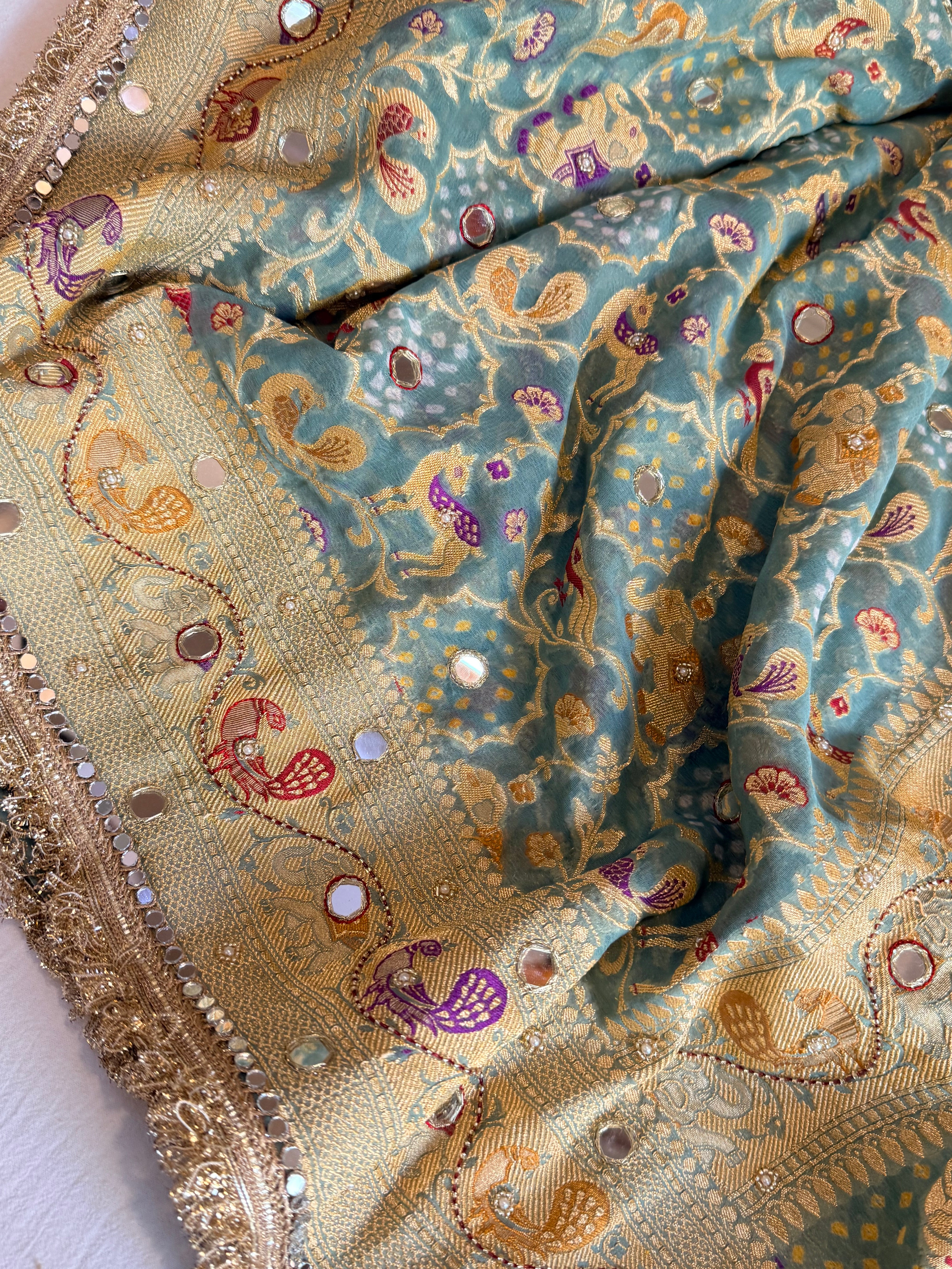 Banarasi blush shades of chiffon rai bandhej mirror work hand embroidered saree