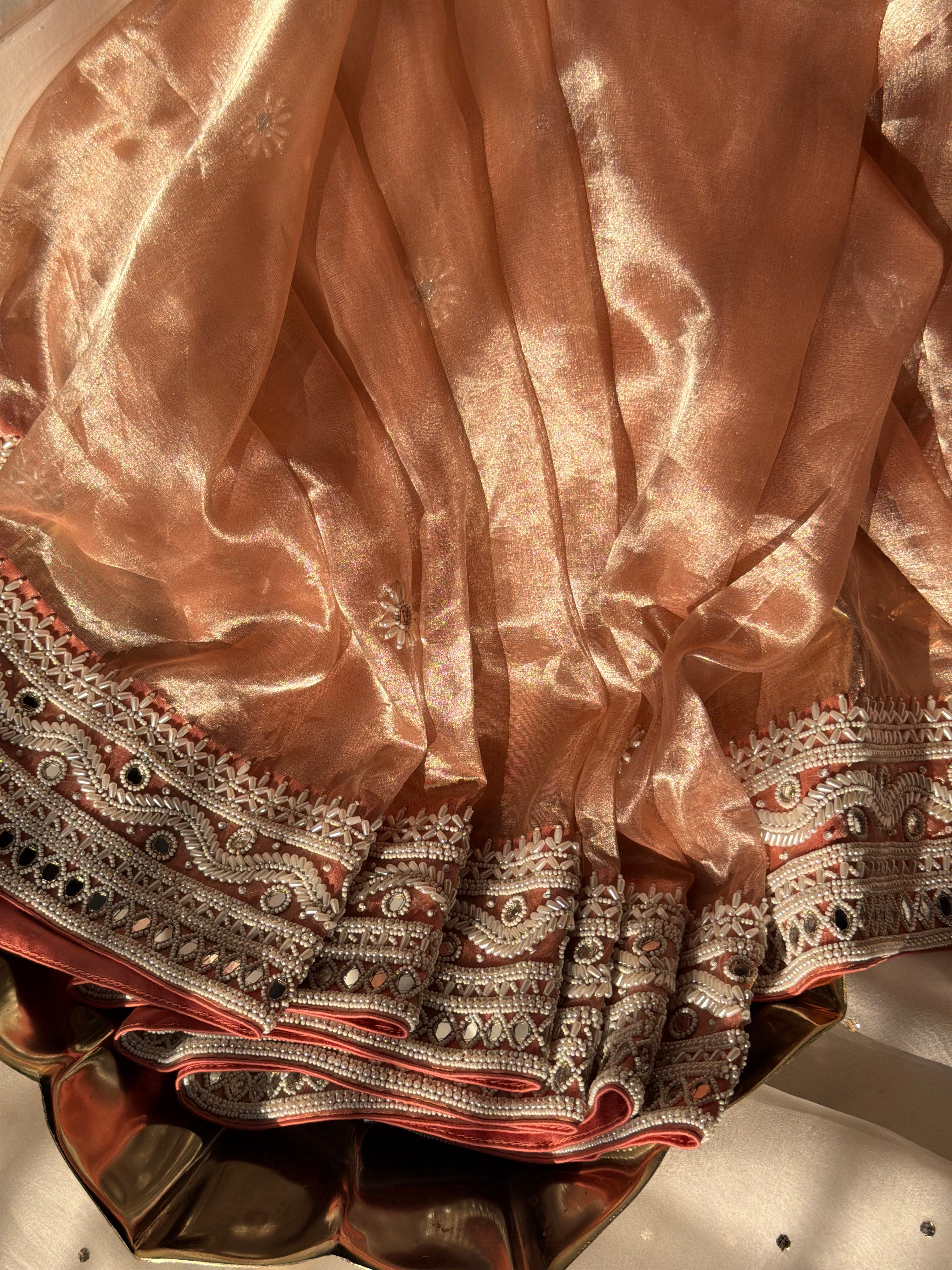 Gajri peach mirrorwork and pearlwork hand embroidered diamond tissue saree