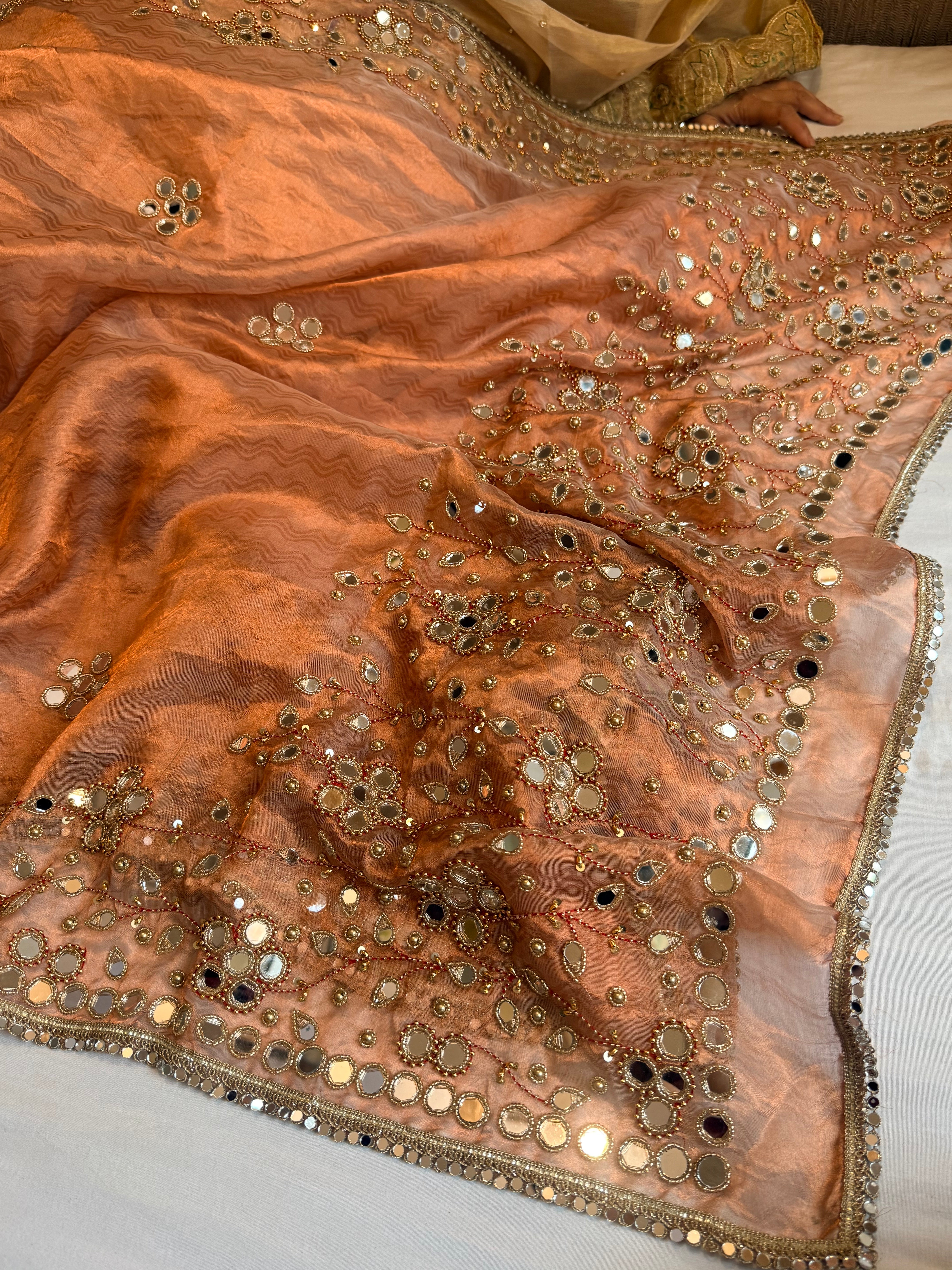 Mirrorwork & Jadauwork border tissue silk hand embroidered kadhwa copper saree