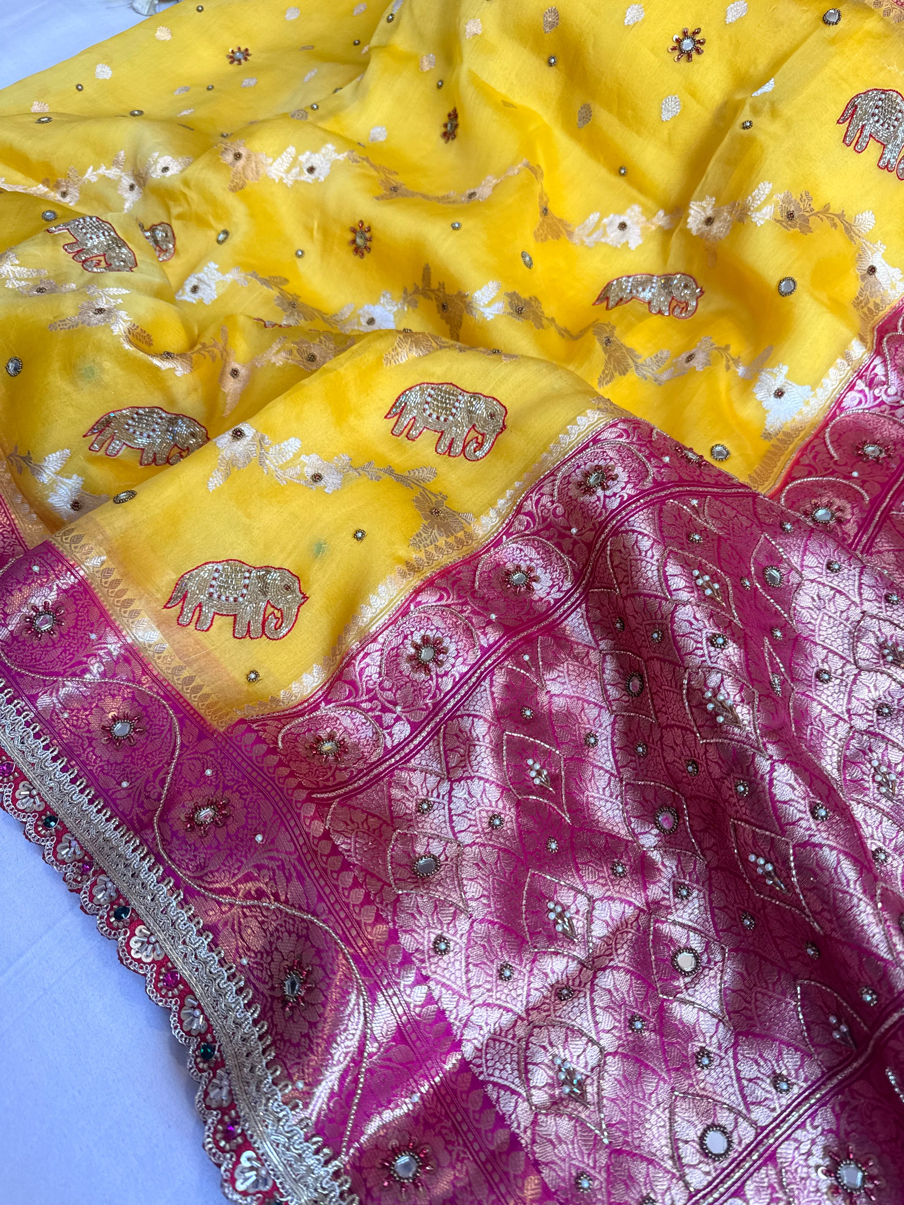 Peeli gulabi phere wali kora silk hand embroidered kadhwa saree