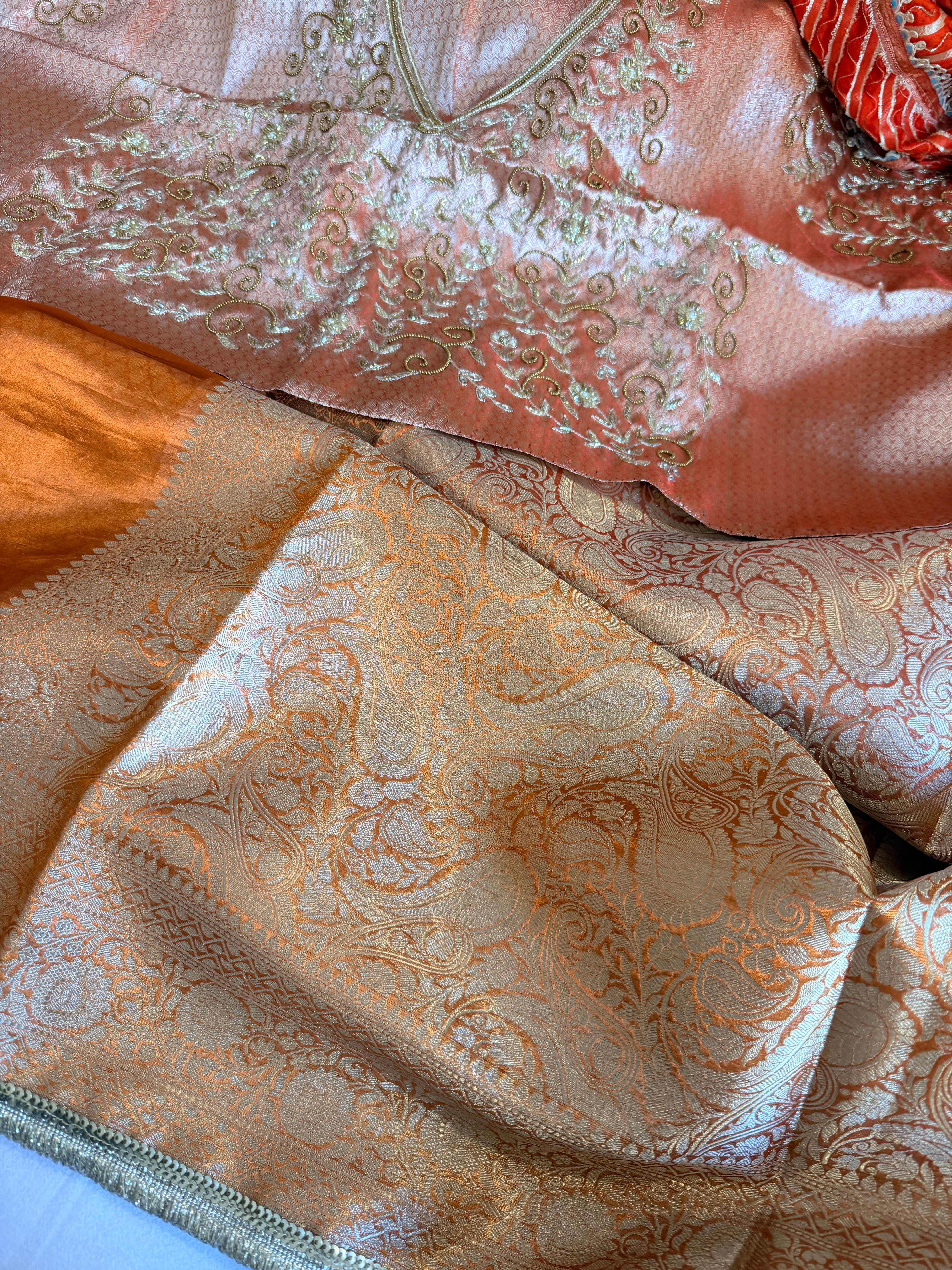 Metallic orange husn tissue silk hand embroidered saree with heavy blouse