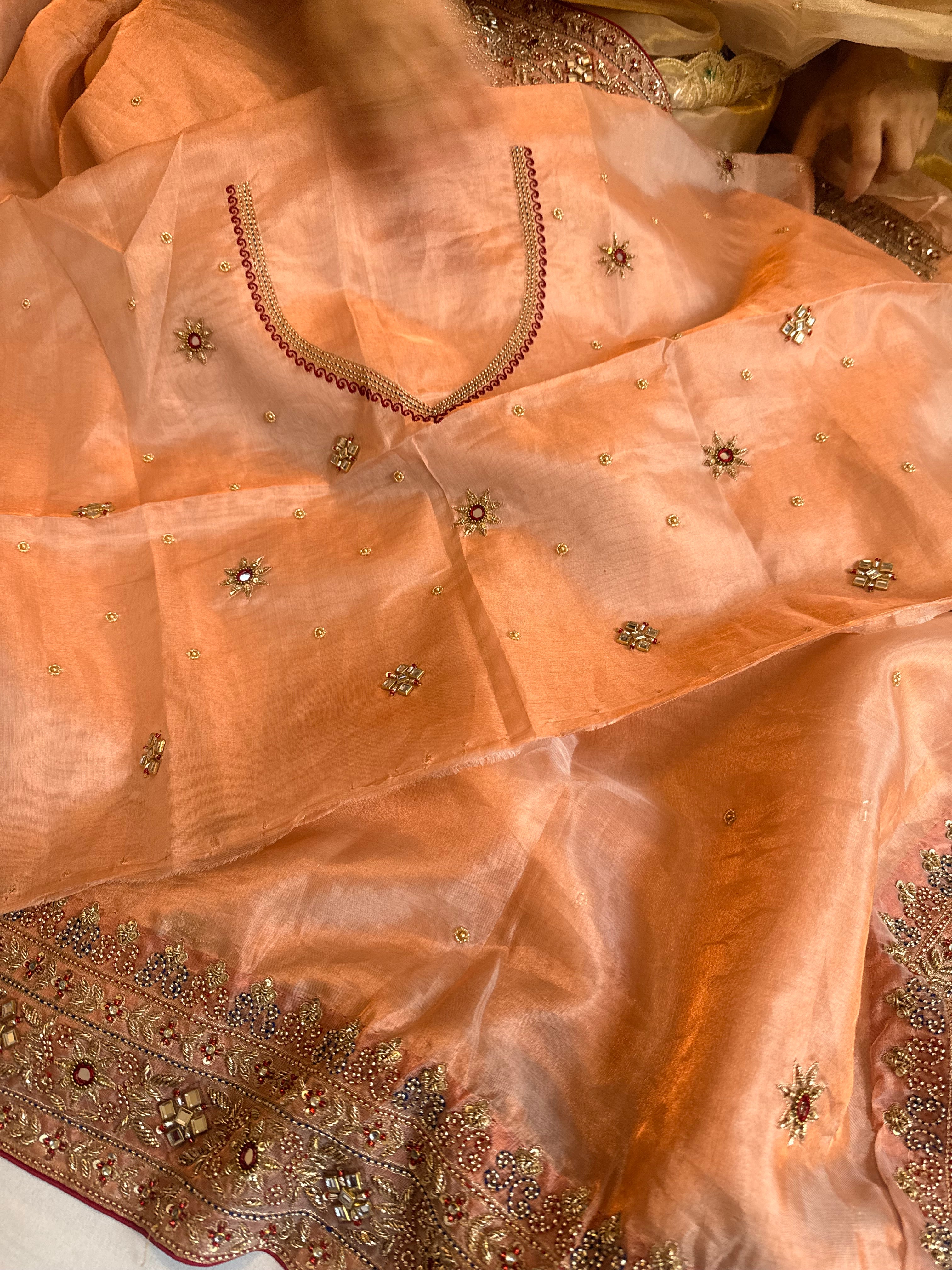 Zardozi & Jadauwork border tissue silk hand embroidered kadhwa copper saree