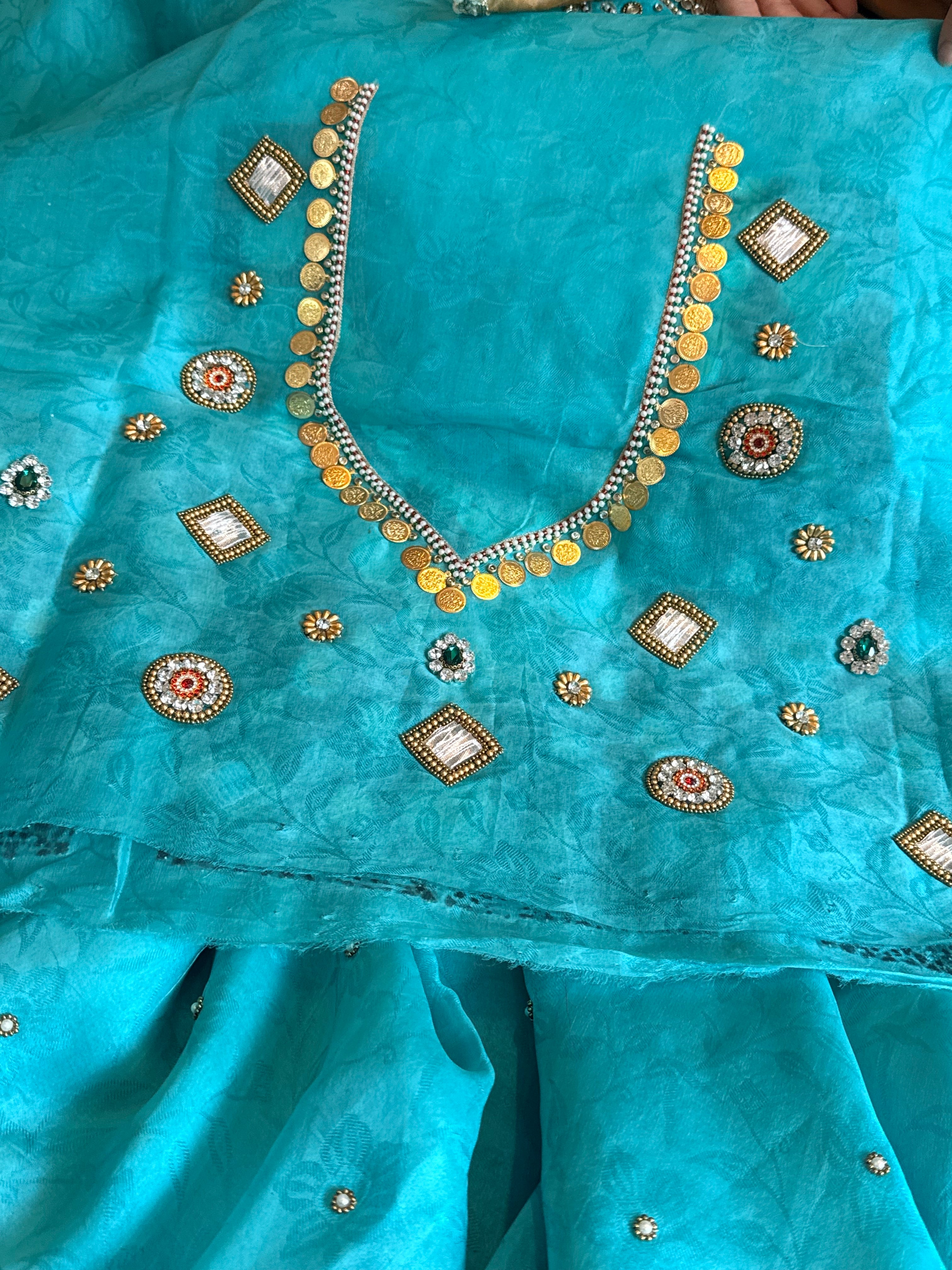 Jadauwork tissue tanchoi silk hand embroidered kadhwa saree
