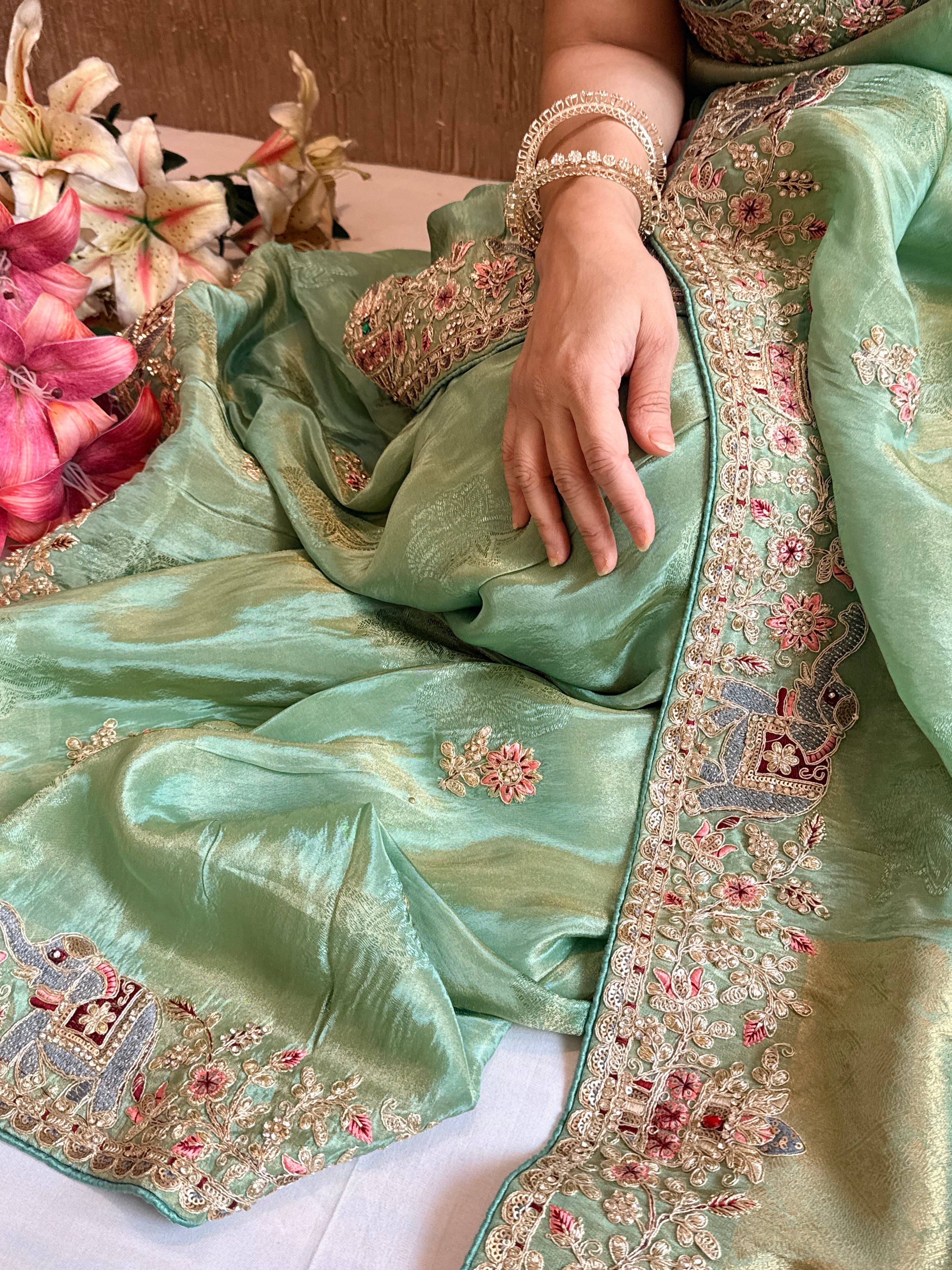 Sea green hathi wali crepe tissue embroidered saree