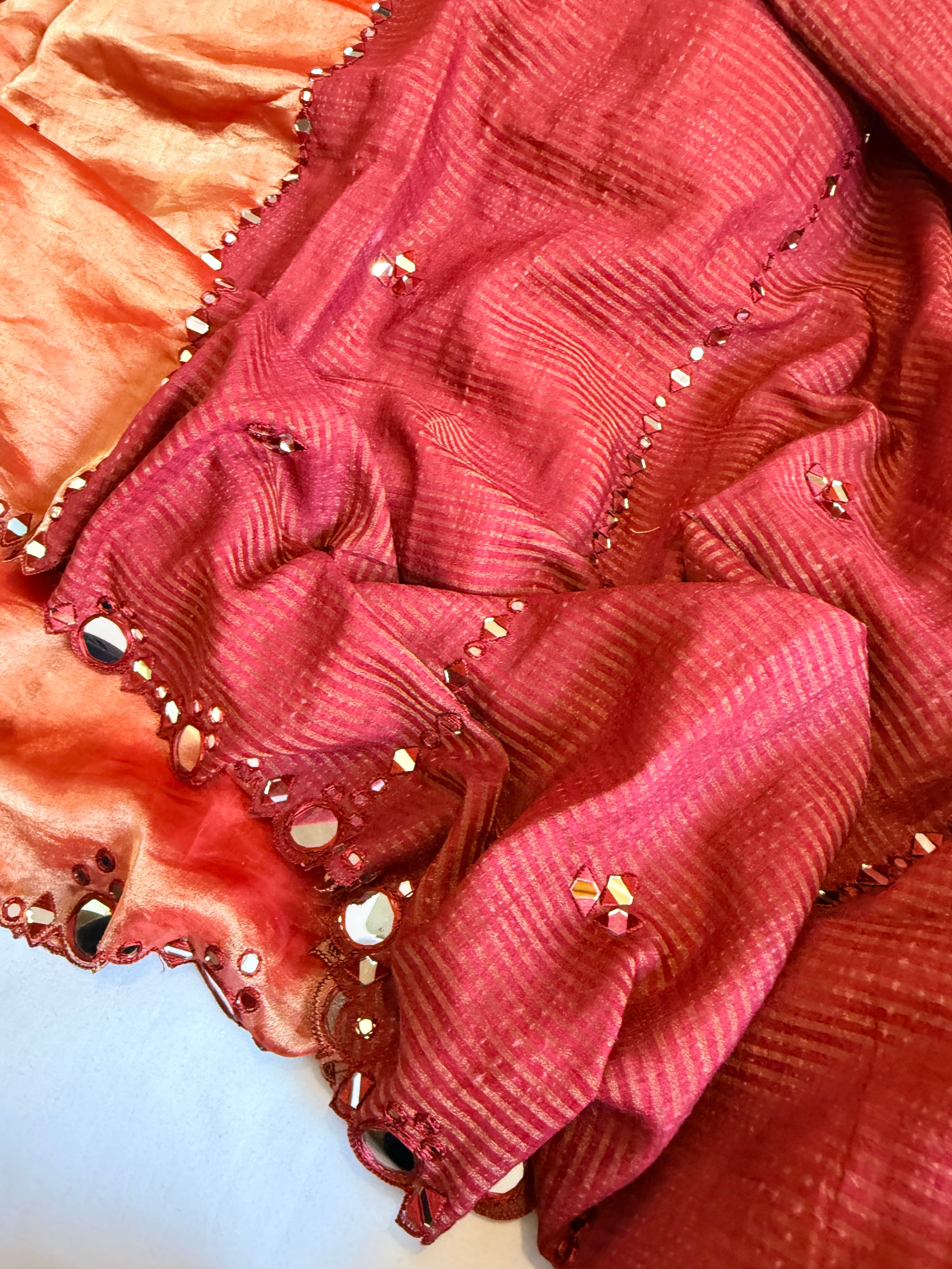 Rustic red half striped-half tissue mirror work hand embroidered kadhwa saree
