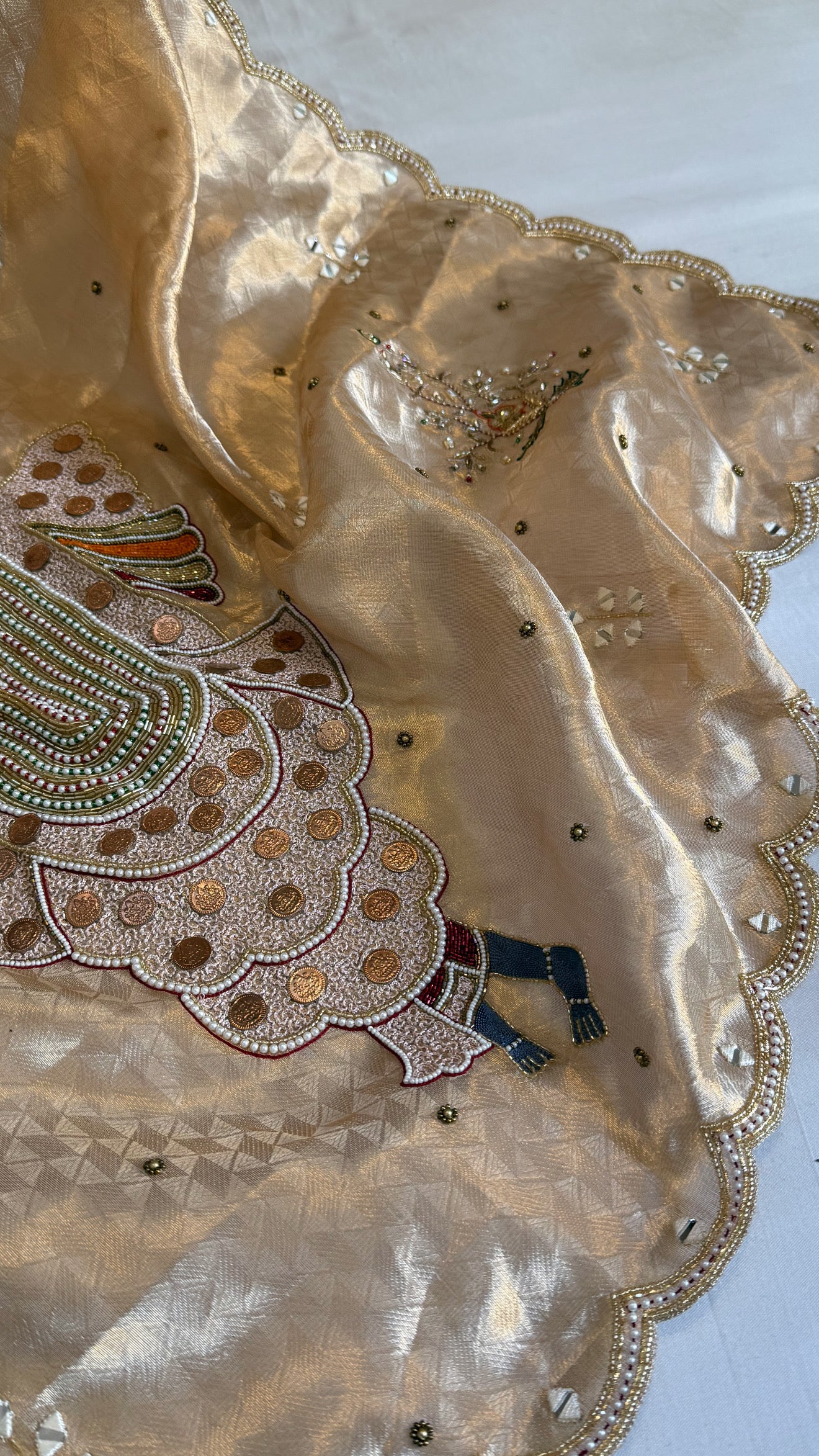 Shrinathji motif inspired molten tissue brocade kadhwa weaving hand embroidered saree