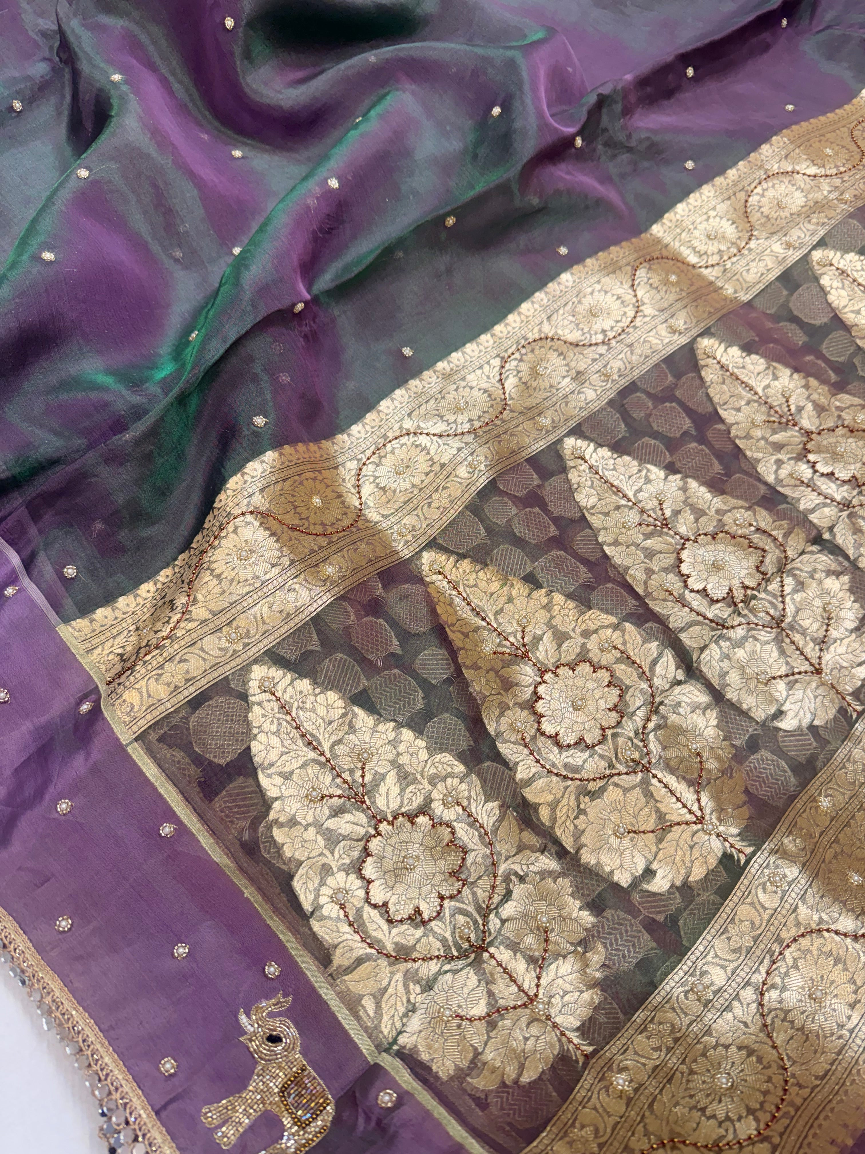 Midnight purple-green dhup chao effect tissue silk hand embroidered saree