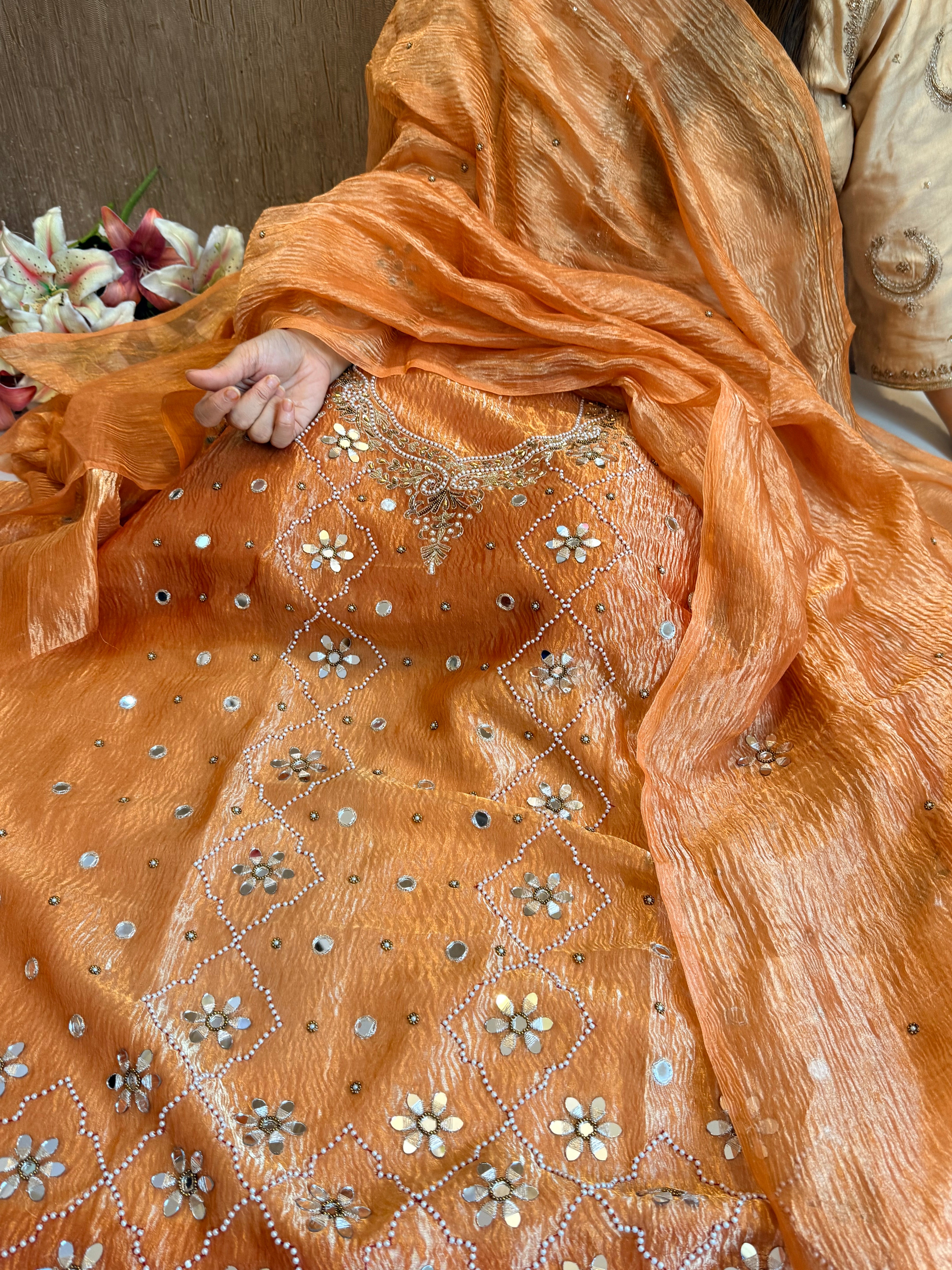 Peachy orange crush tissue silk mirrorwork hand embroidered kadhwa suits