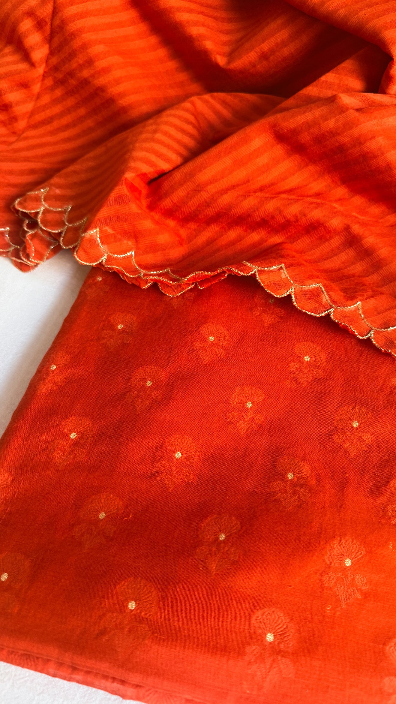 Summer suits under 8k - Mul cotton burnt orange kurta paired with cotton sscalloped duppata set