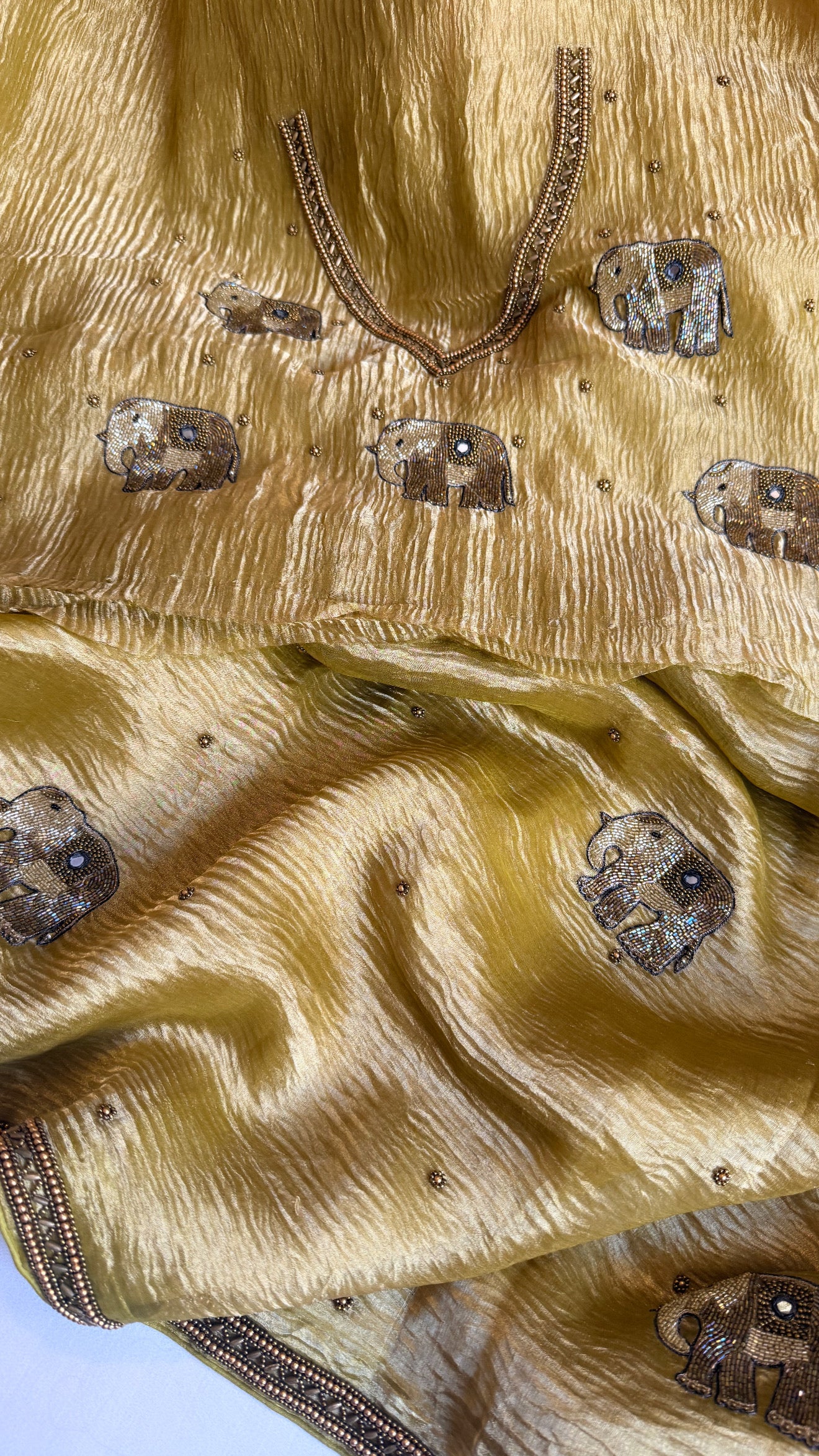 Mirrorwork edit lemon yellow crushed tissue silk hand embroidered saree