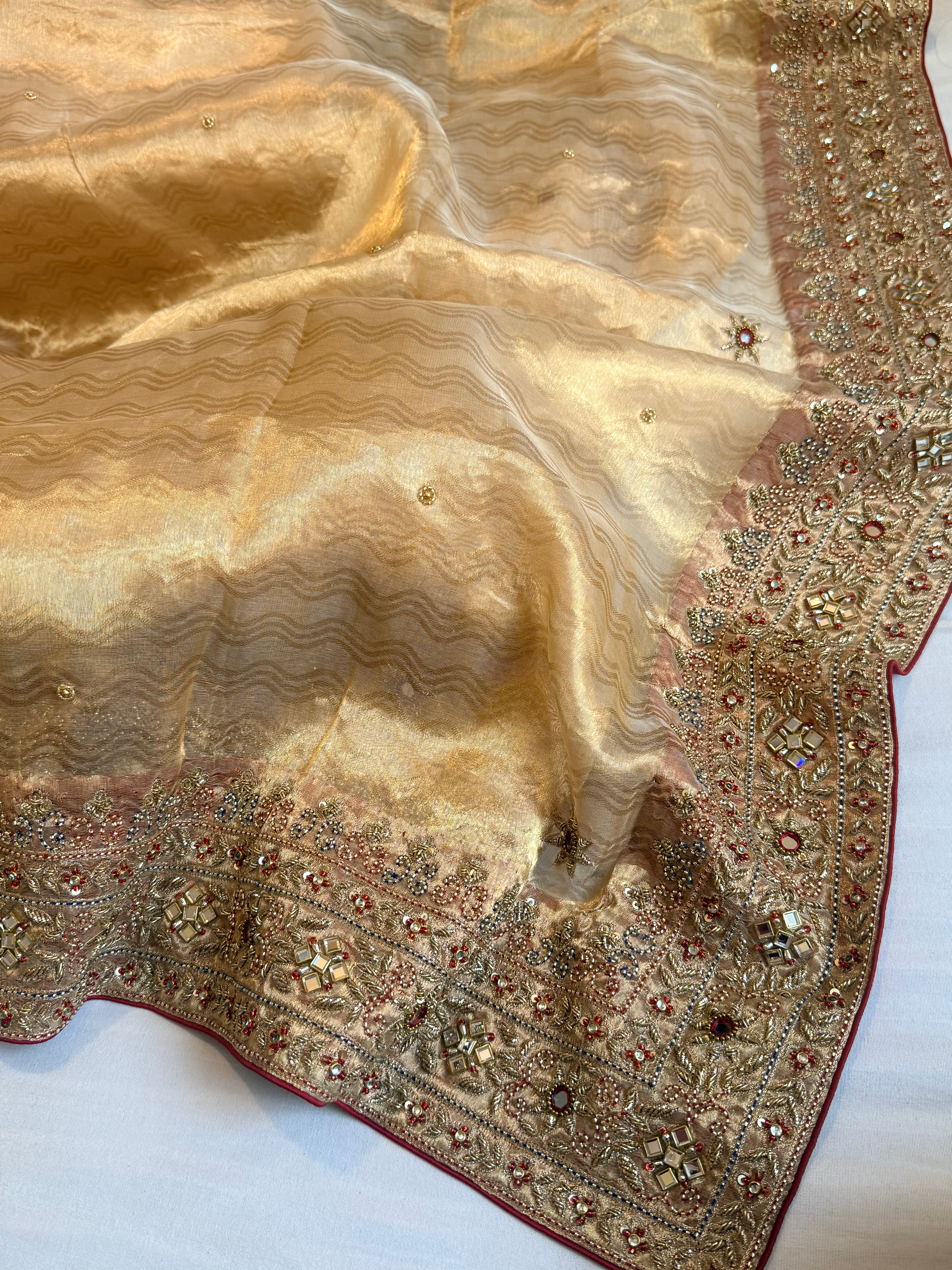 Zardozi & Jadauwork border tissue silk hand embroidered kadhwa butter gold saree