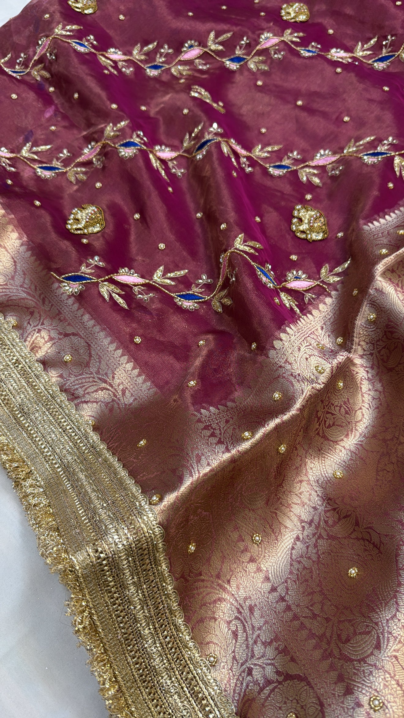 Grapewine purple elephant motif tissue silk hand embroidered kadhwa saree