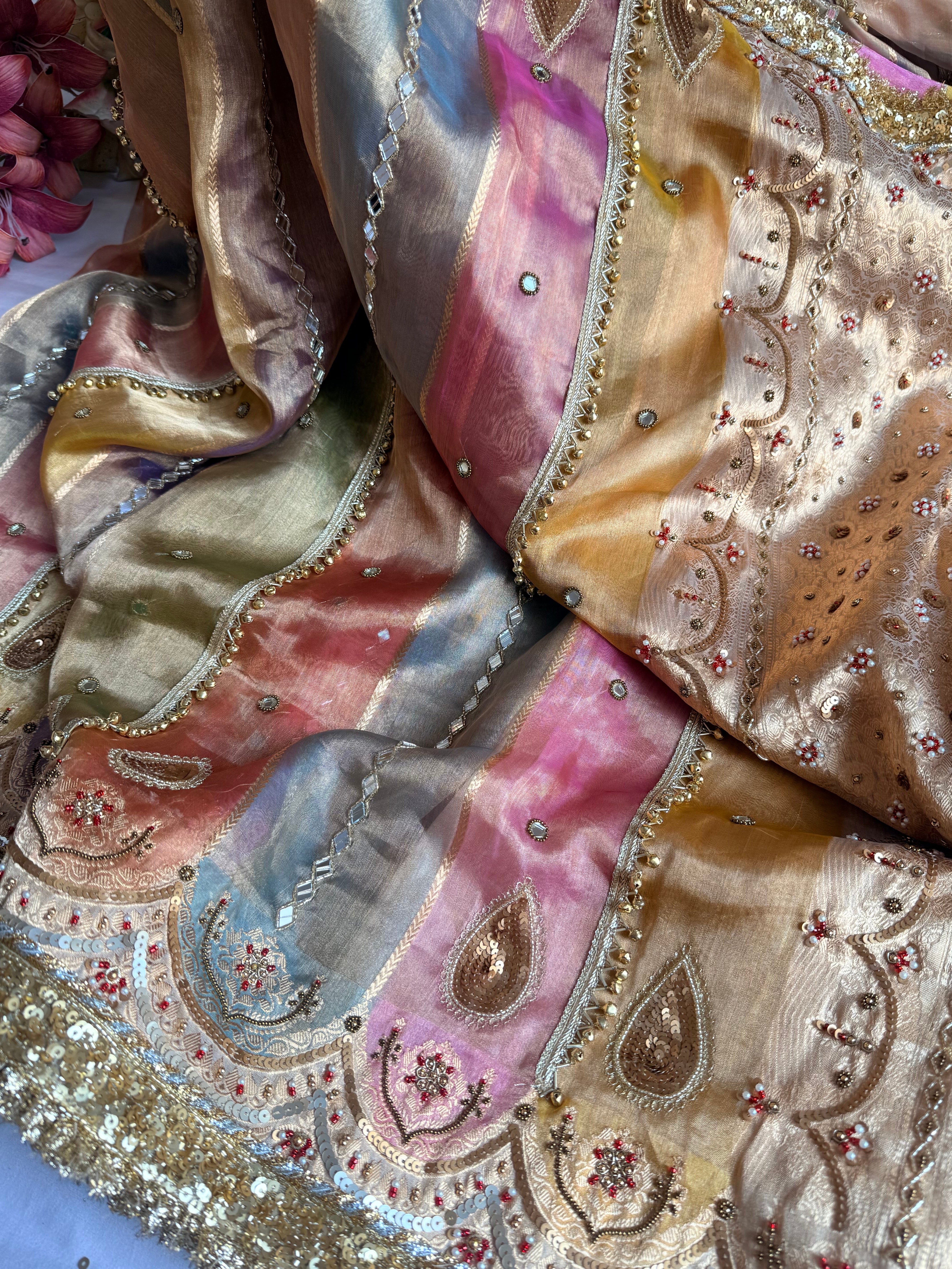 Navratan edit tissue silk rangkaat and ghungroo work hand embroidered saree