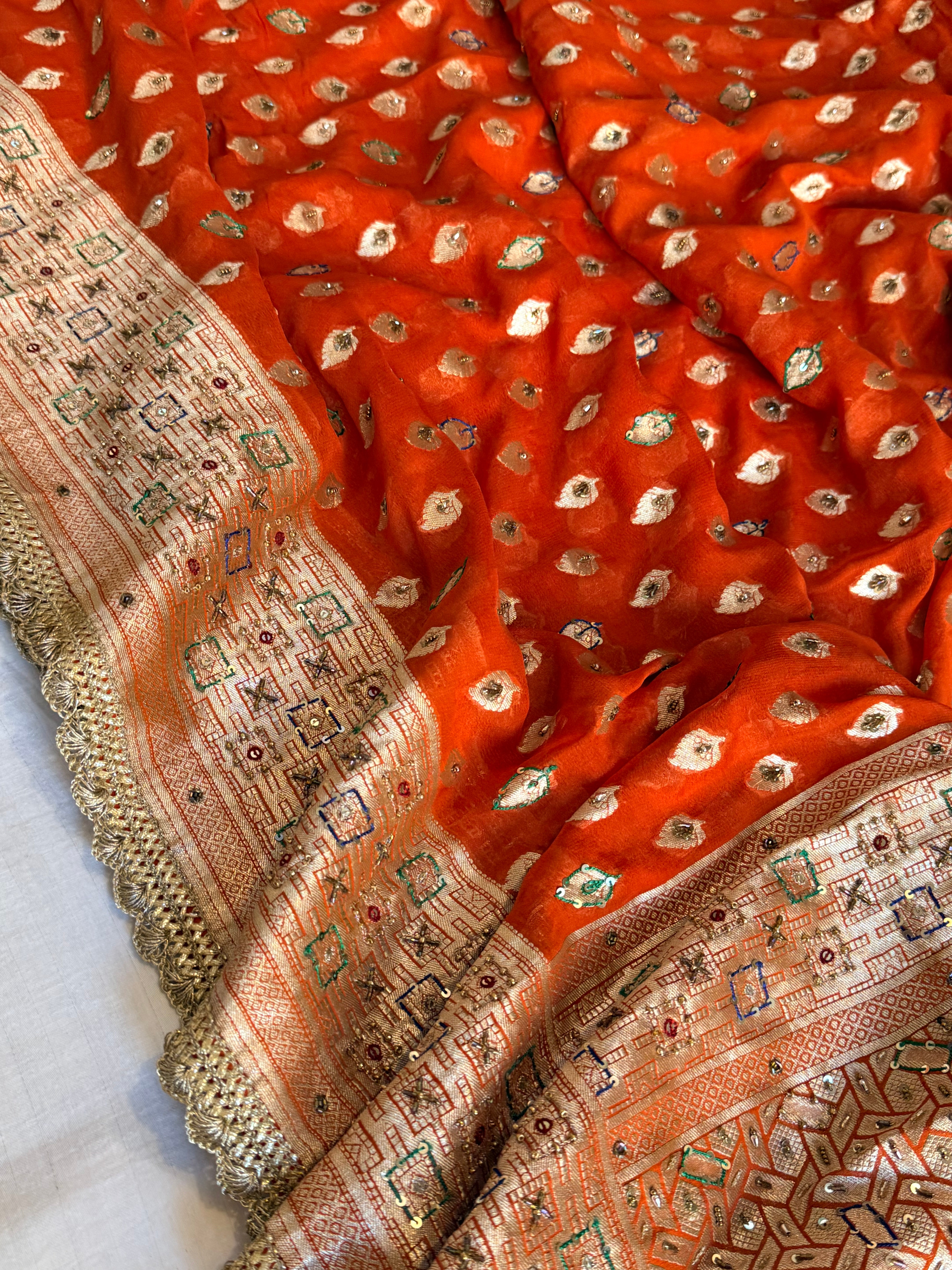 Banarasi moonga gorgette fanta orange hand embroidered kadhwa saree